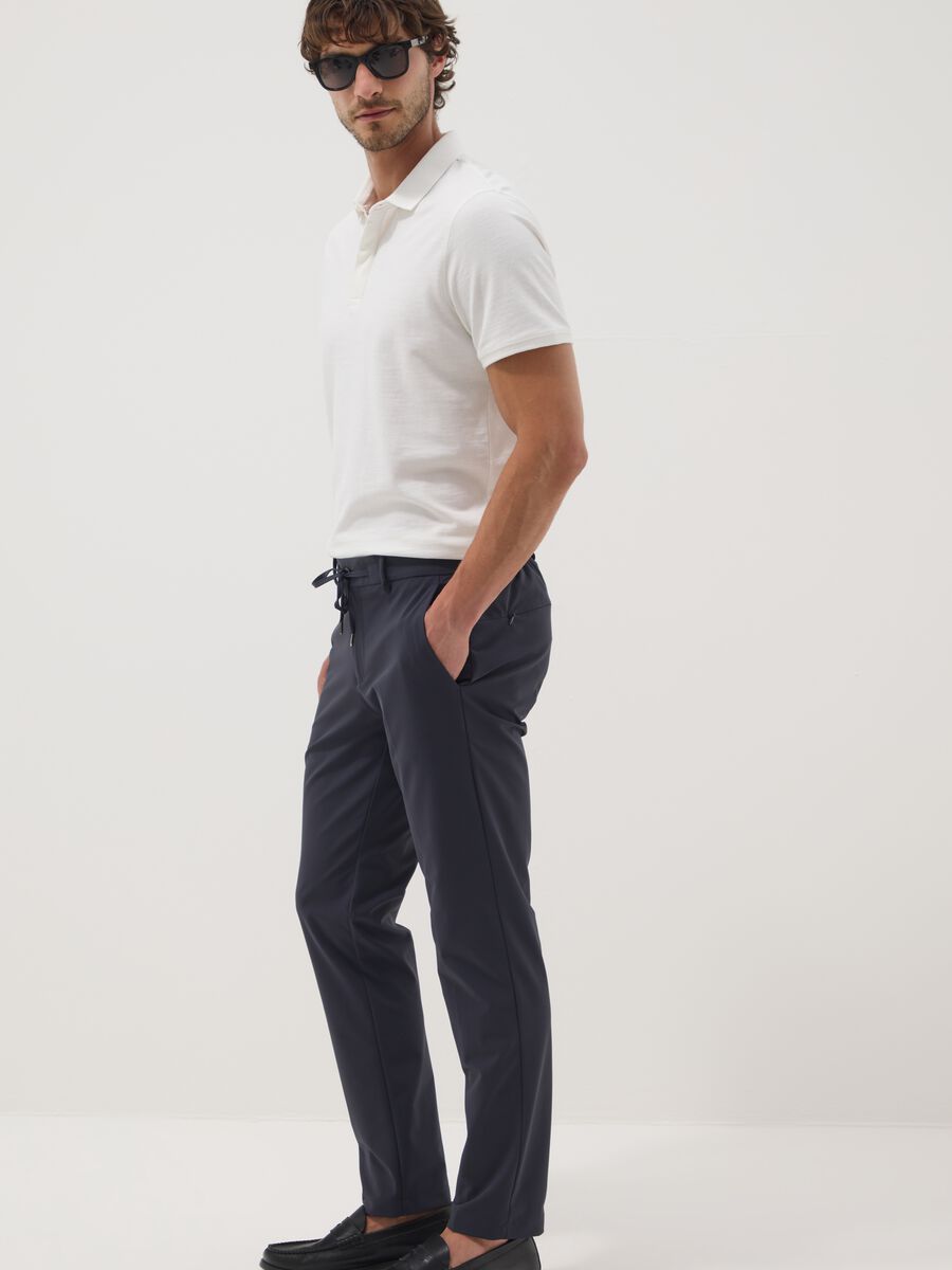 Blue stretch-fabric chino trousers_0