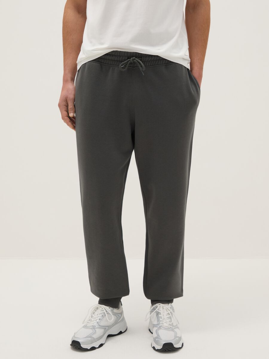 Grey cotton blend jogger trousers regular fit_1