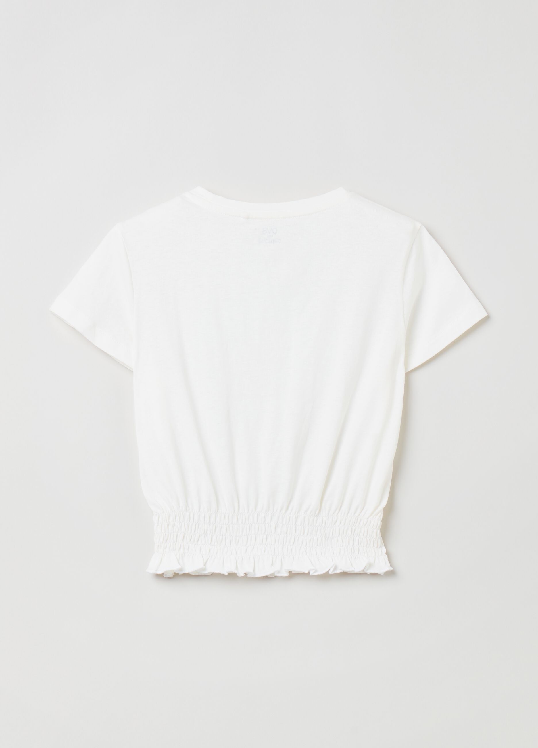 Camiseta de algodón con bajo elástico