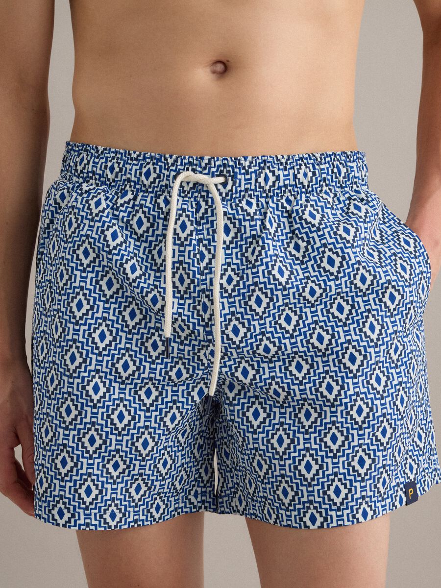 Blue swim shorts with geometric print_2