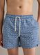 Blue swim shorts with geometric print_1