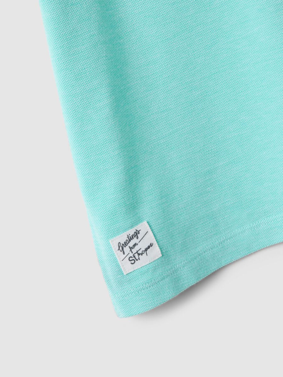 Polo in puro cotone azzurra da bambino regular fit con ricamo_3
