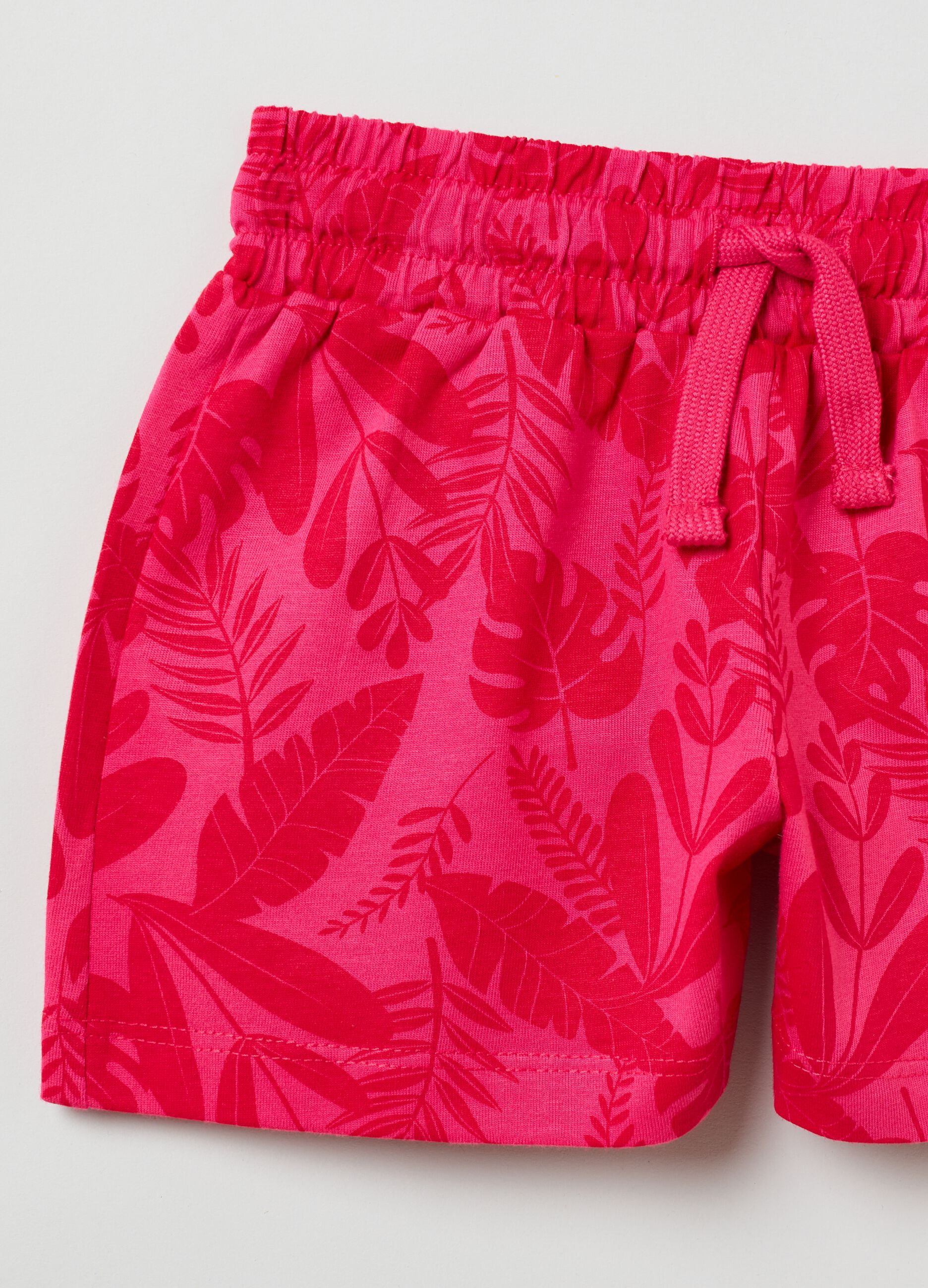 Shorts with all-over tropical leaves print