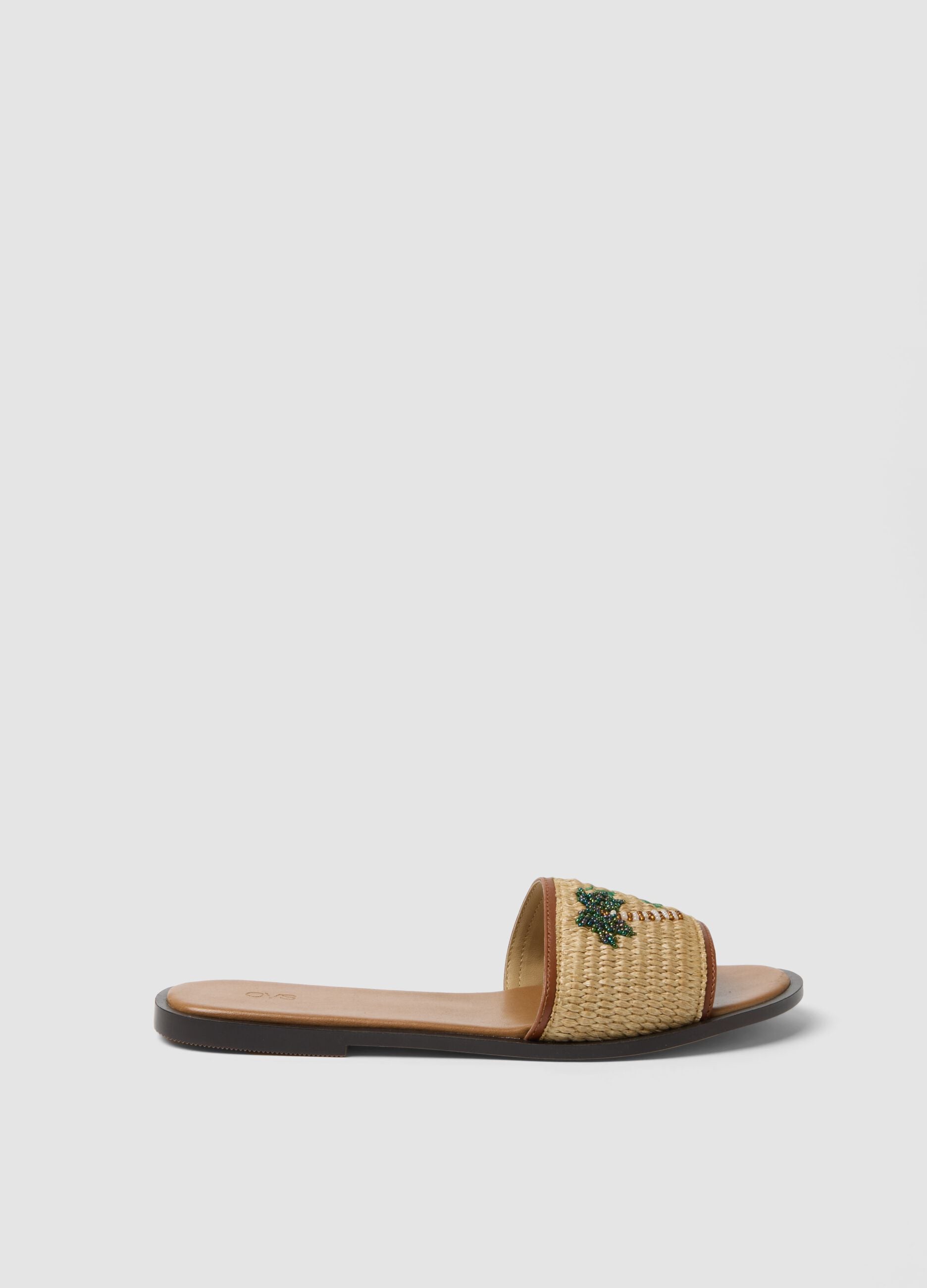 Beige flat sandals with braided embroidered strap