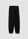 Cal&ccedil;as jogger pretas em mistura de algod&atilde;o org&acirc;nico com estampado para rapariga_1