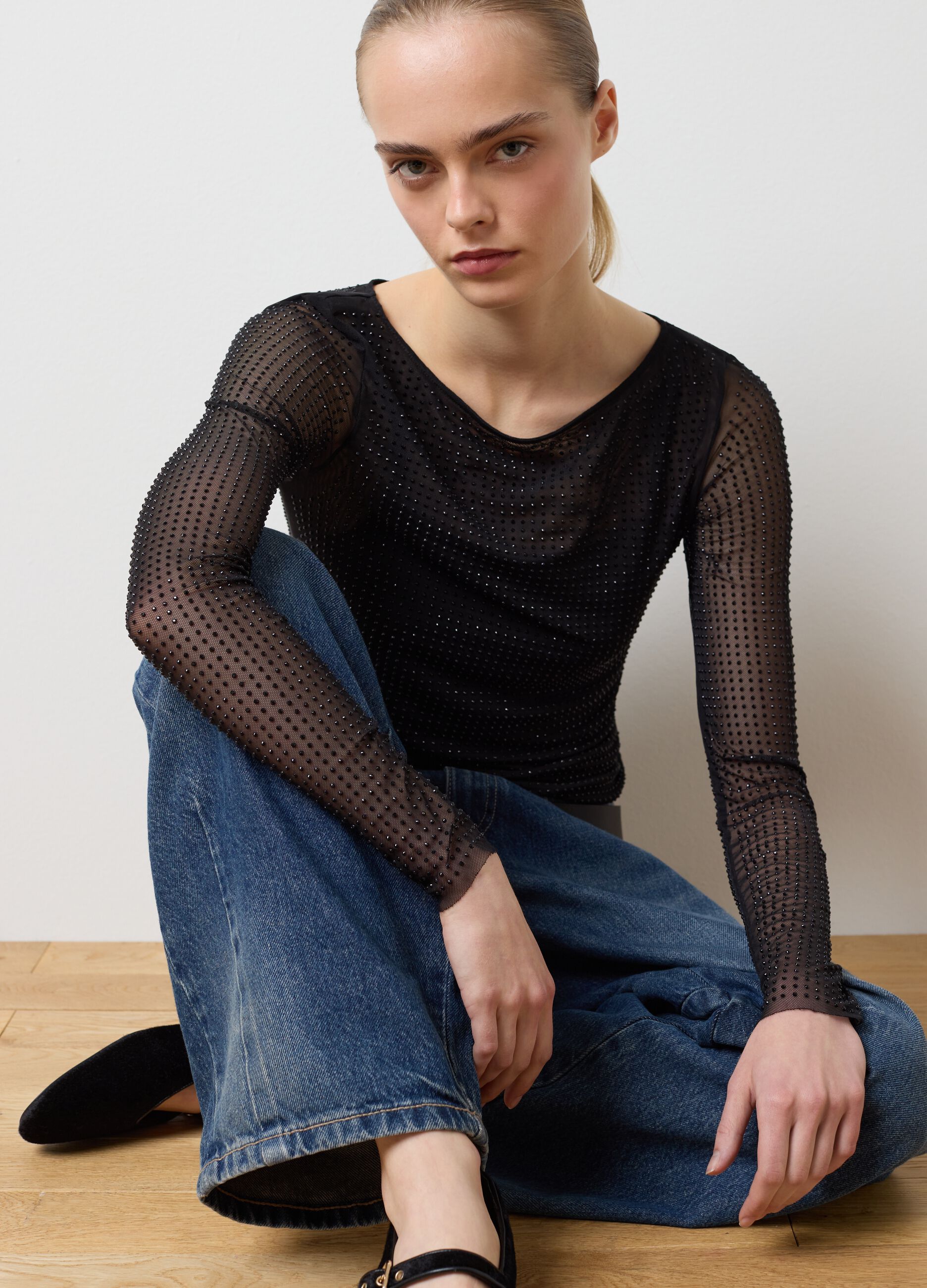 Black regular fit top with transparent sleeves