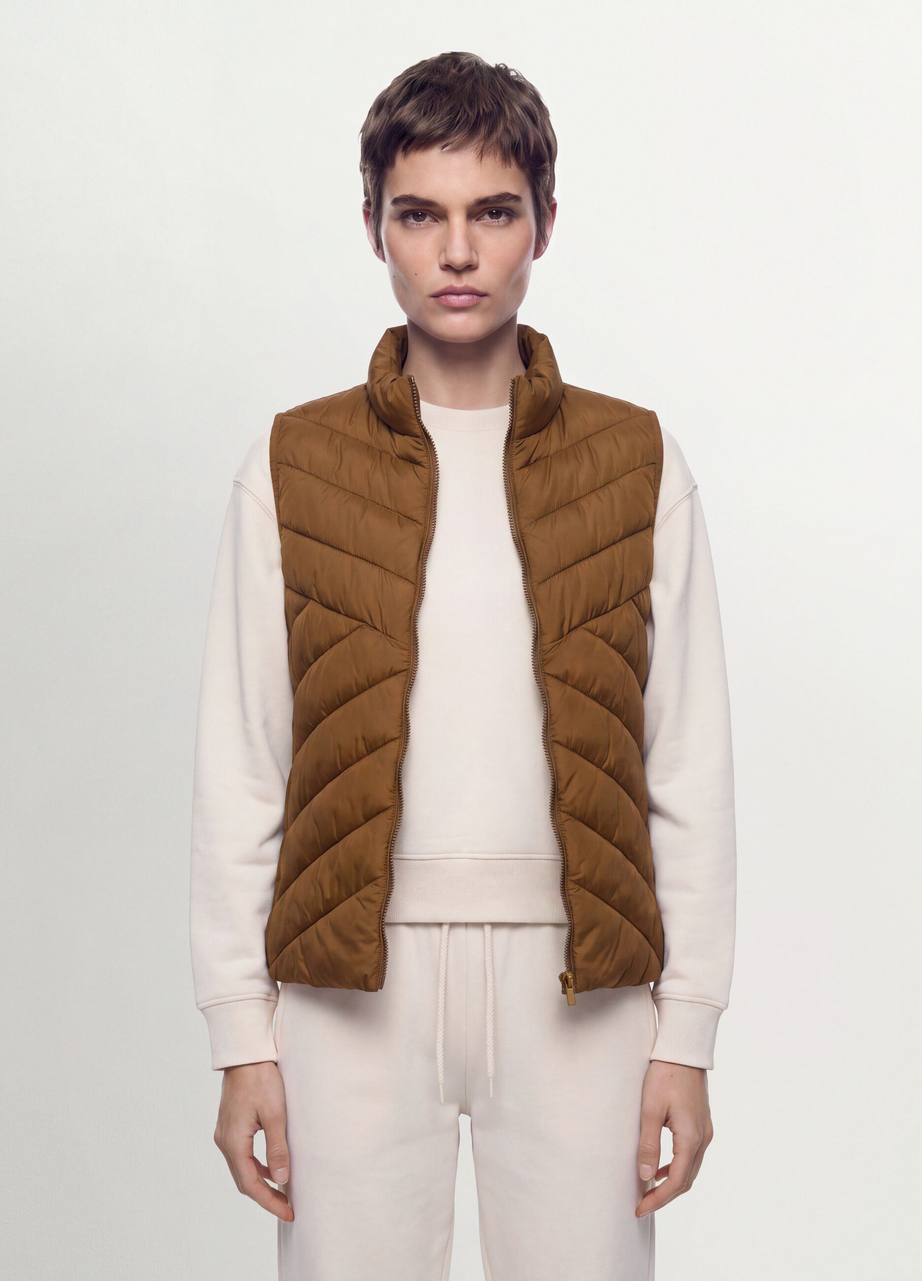Yellow ultralight quilted gilet with zip and high neck