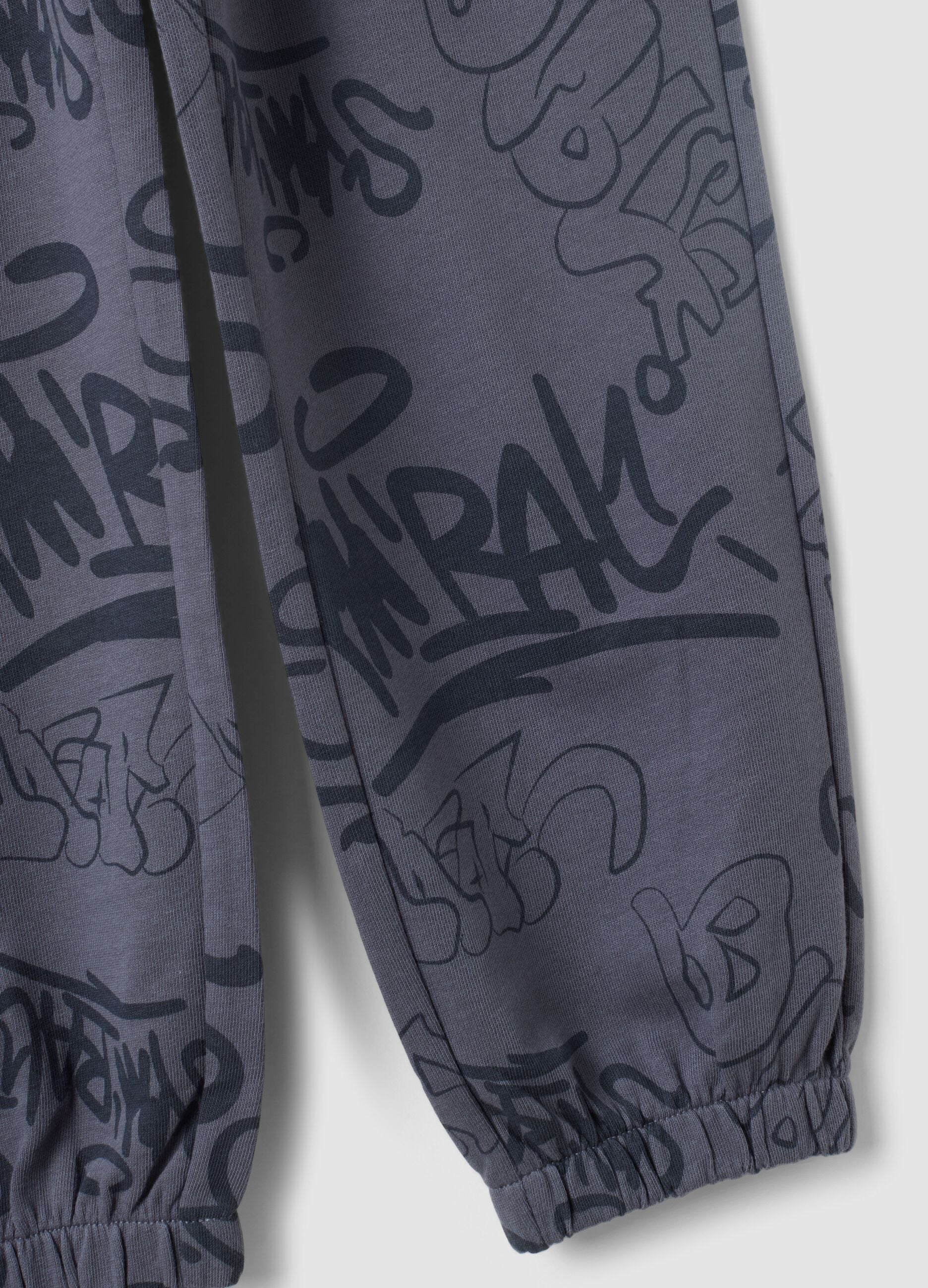 Grey oversized cotton jogger trousers with all-over print for boys