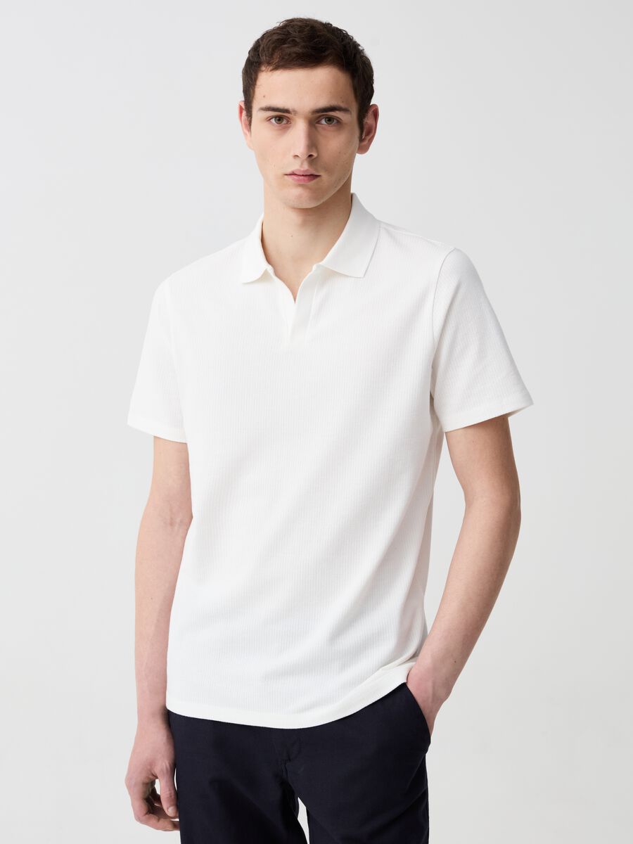 Organic cotton polo shirt with textured weave_0