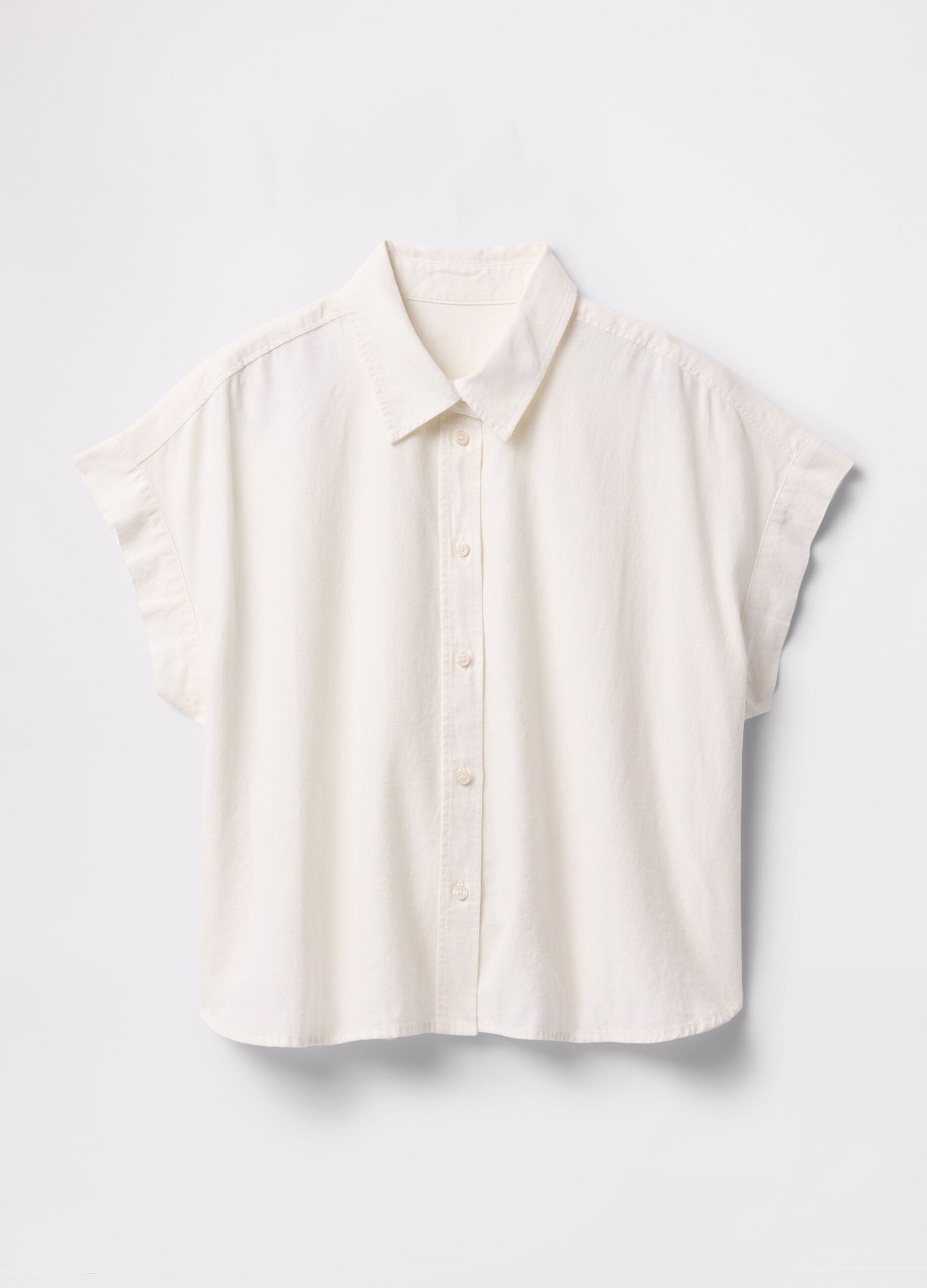 Sleeveless white linen and viscose shirt