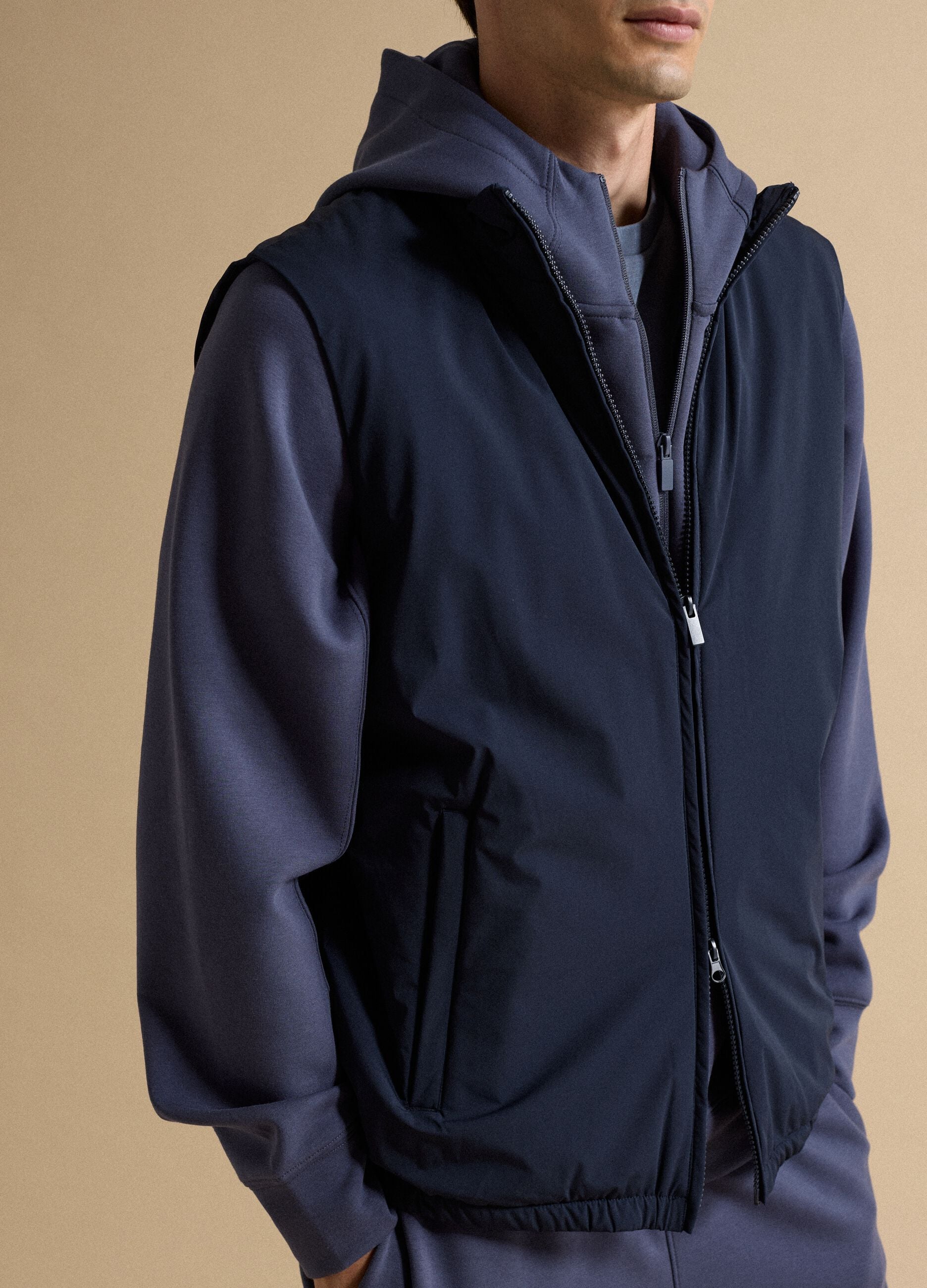 Blue stretch-fabric gilet with zip