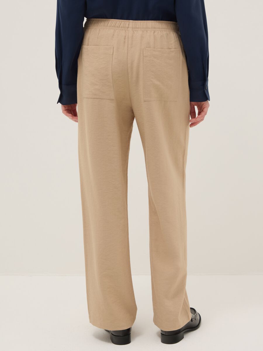 Cal&ccedil;as bege de mistura de viscose com corte regular_2