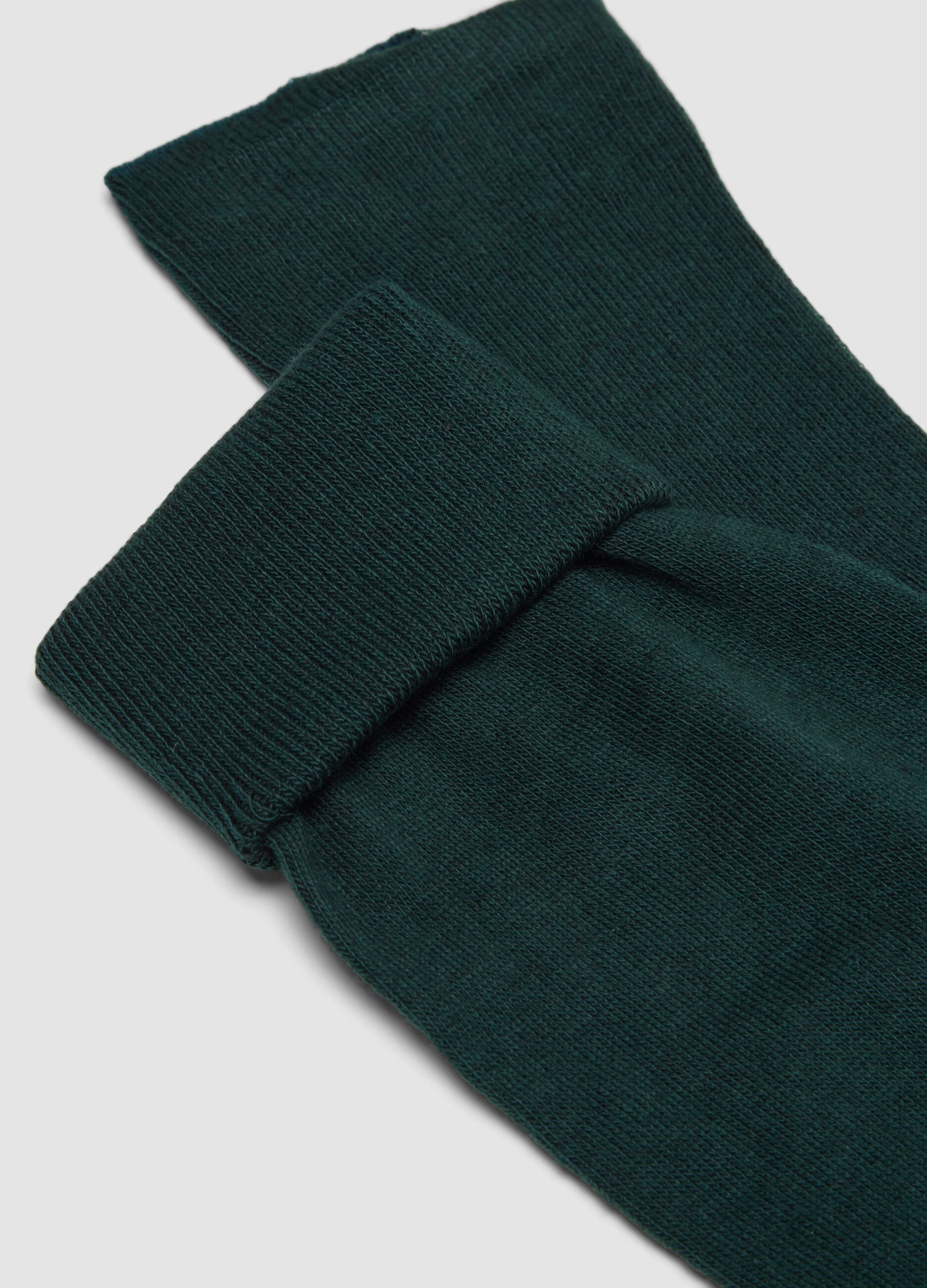 Two-pack of navy blue and teal knee-high socks in a cotton and cashmere blend