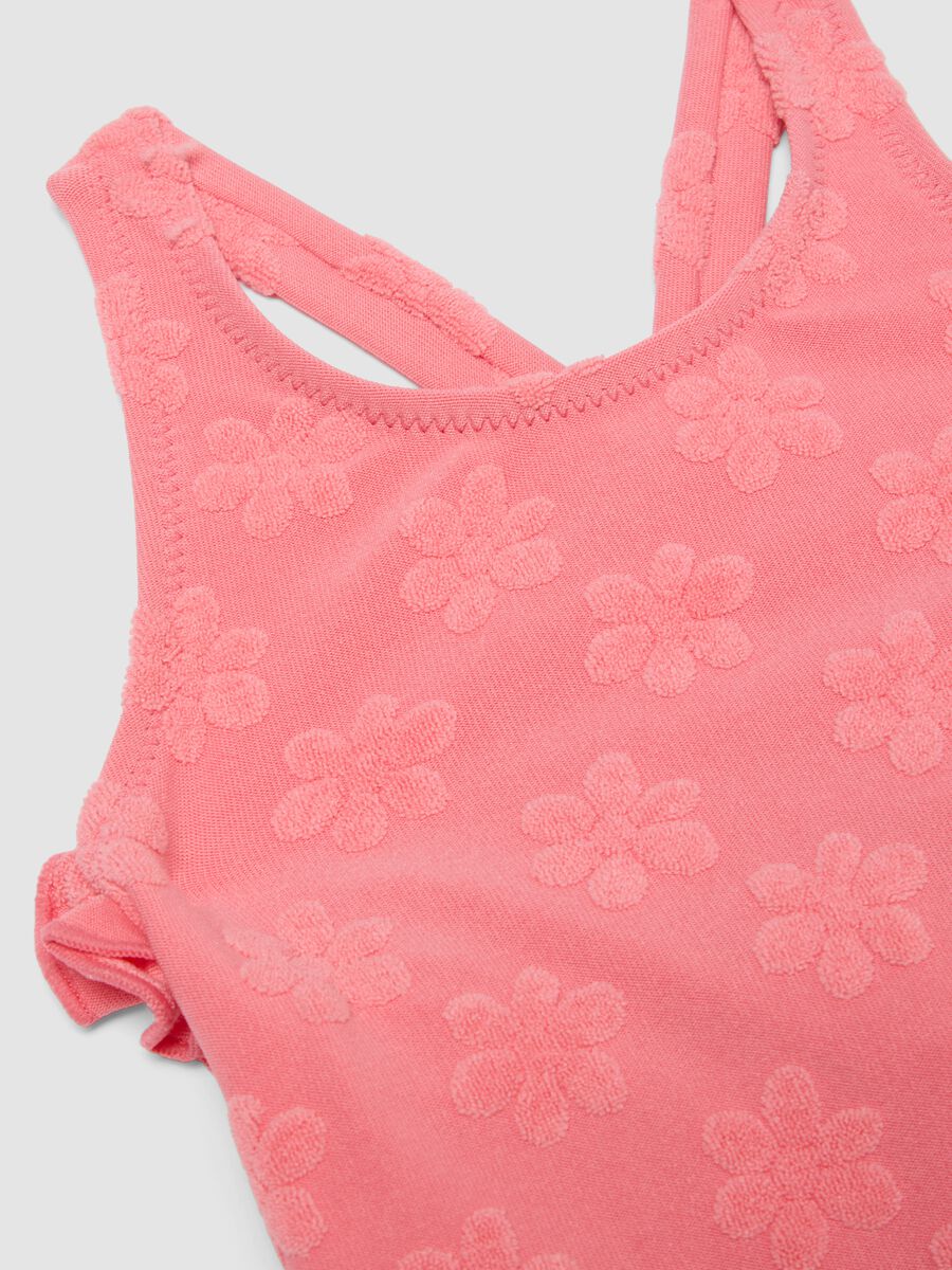 Pink stretch-fabric one-piece swimsuit for baby girls with floral detailing_3