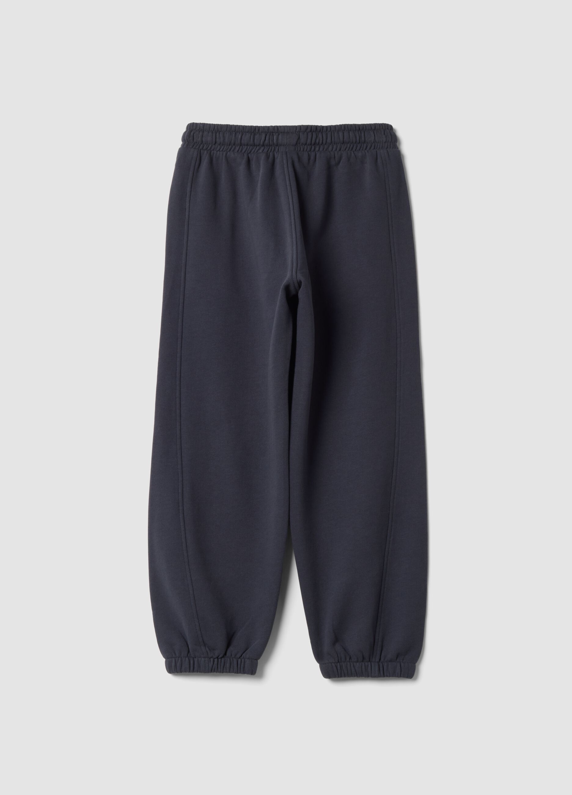 Pantaloni jogger grigi in puro cotone organico con stampa