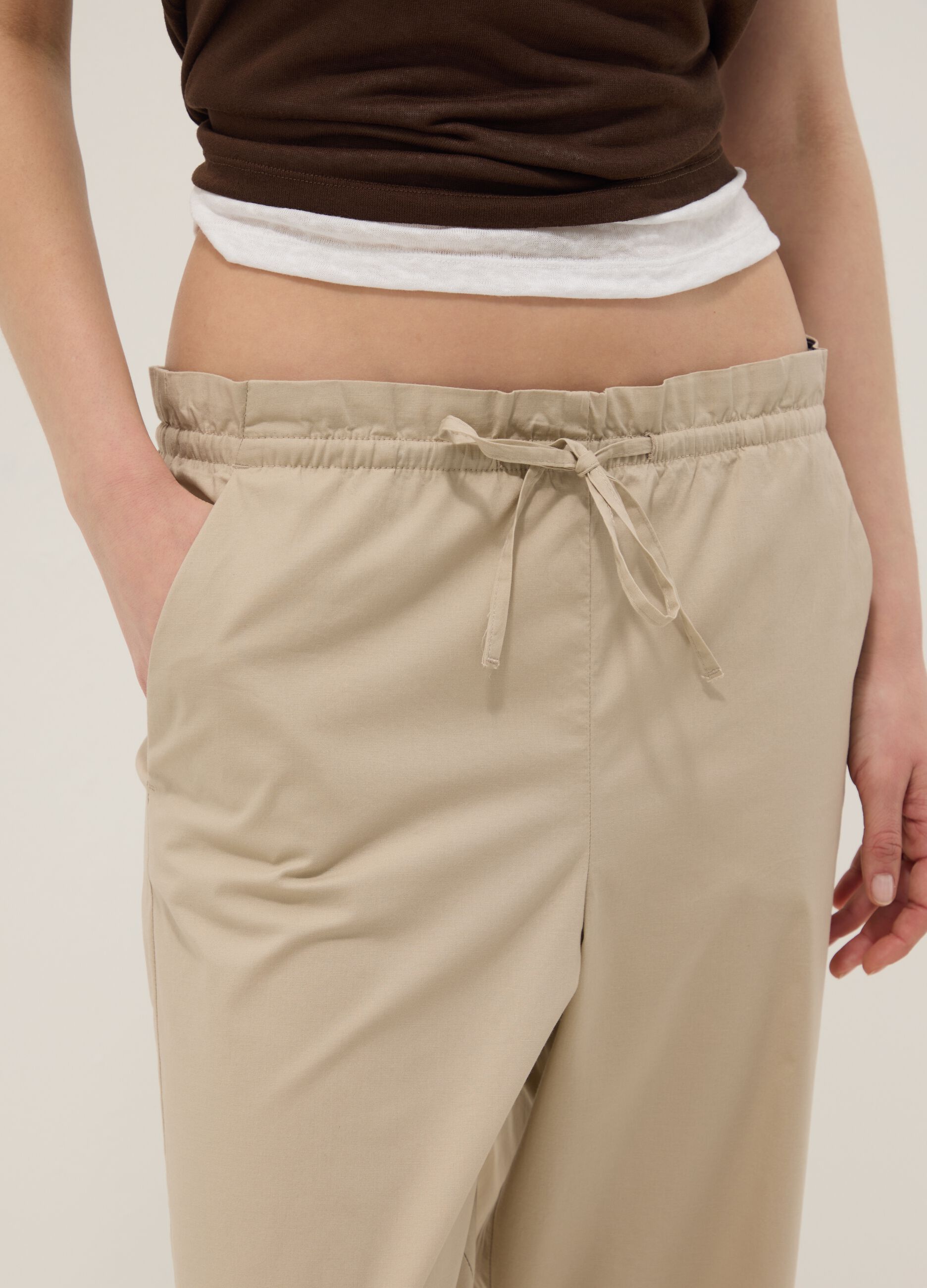 Beige stretch-cotton trousers with elasticated waistband