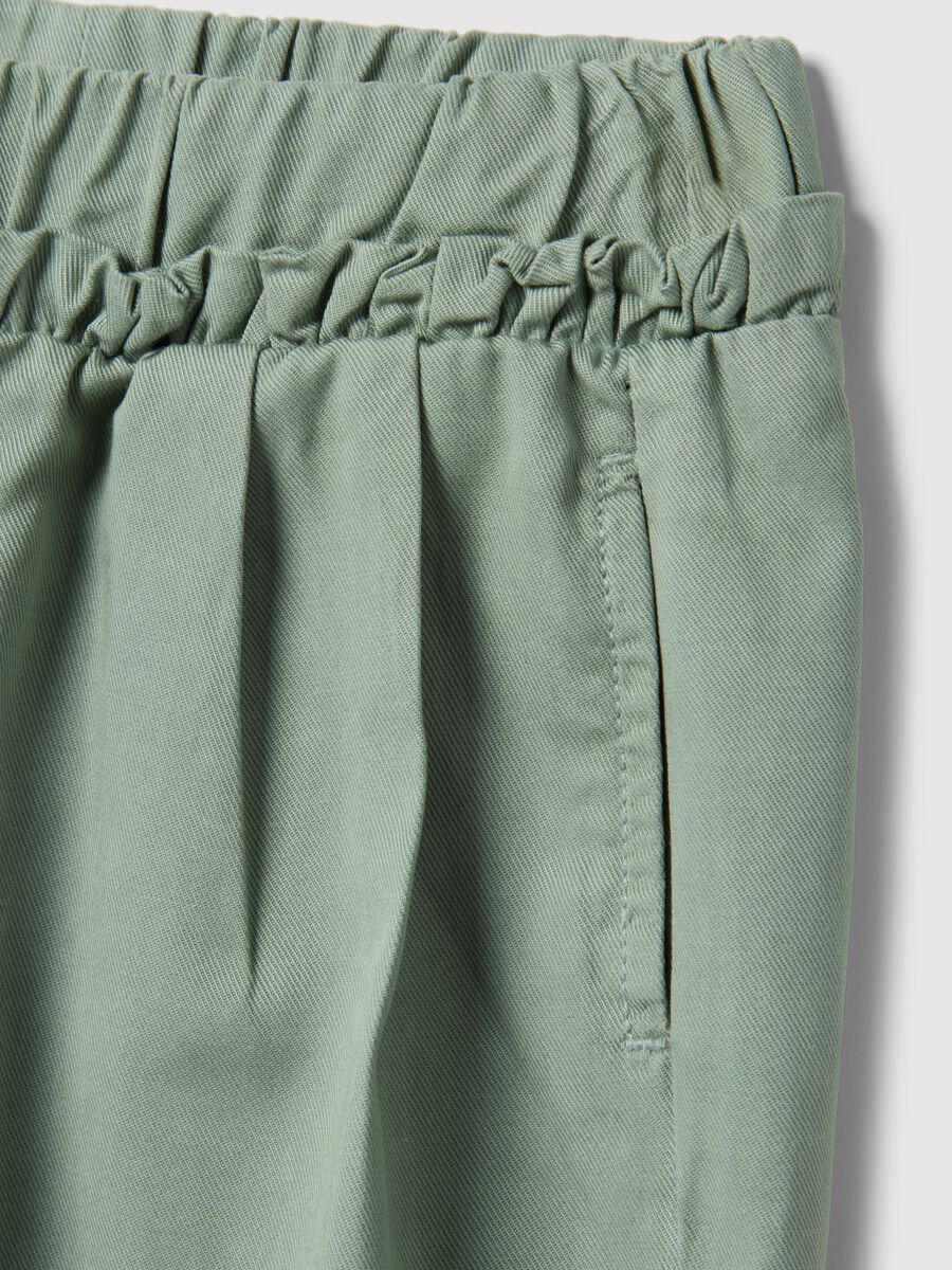 Green girl's baggy trousers in lyocell and cotton_2