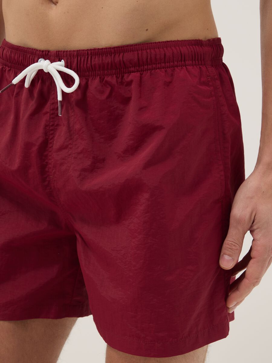Red regular-fit swim shorts with drawstring_4