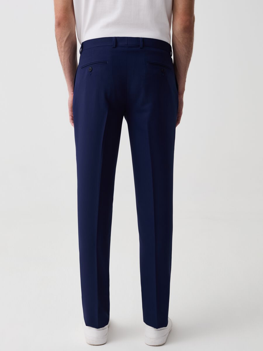Solid colour slim-fit trousers_2