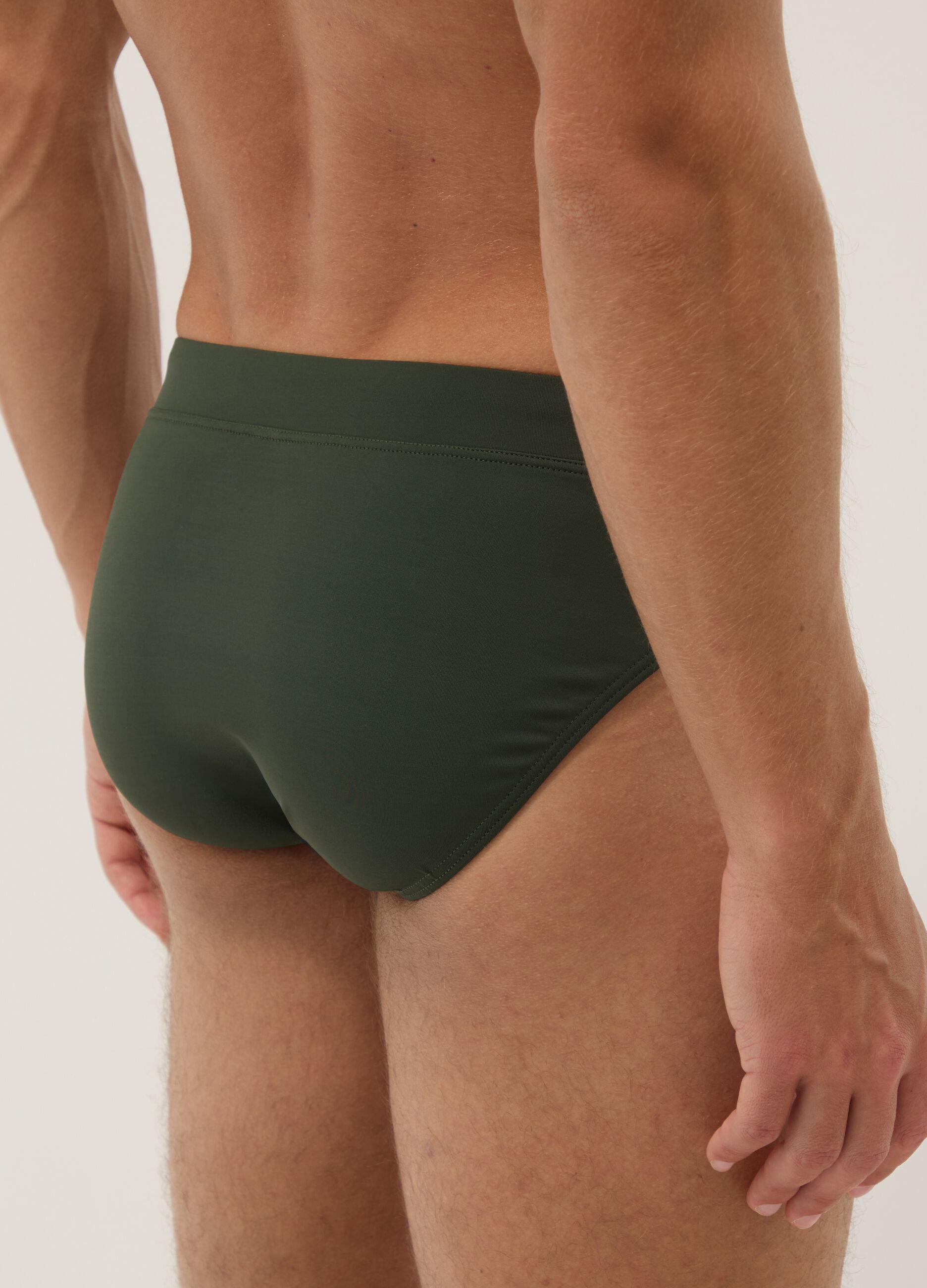 Green stretch fabric swim briefs