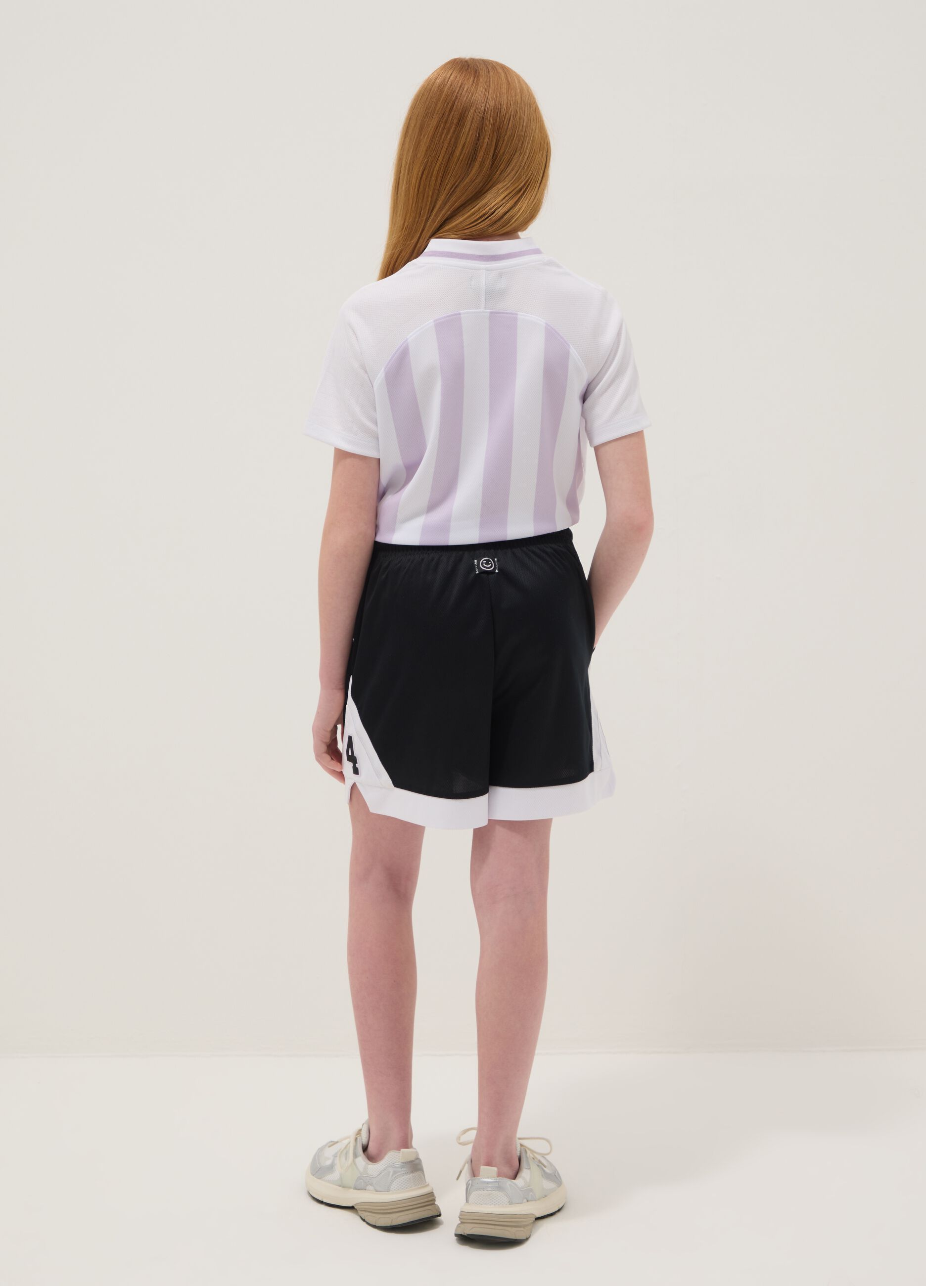 Black sporty shorts with white inserts