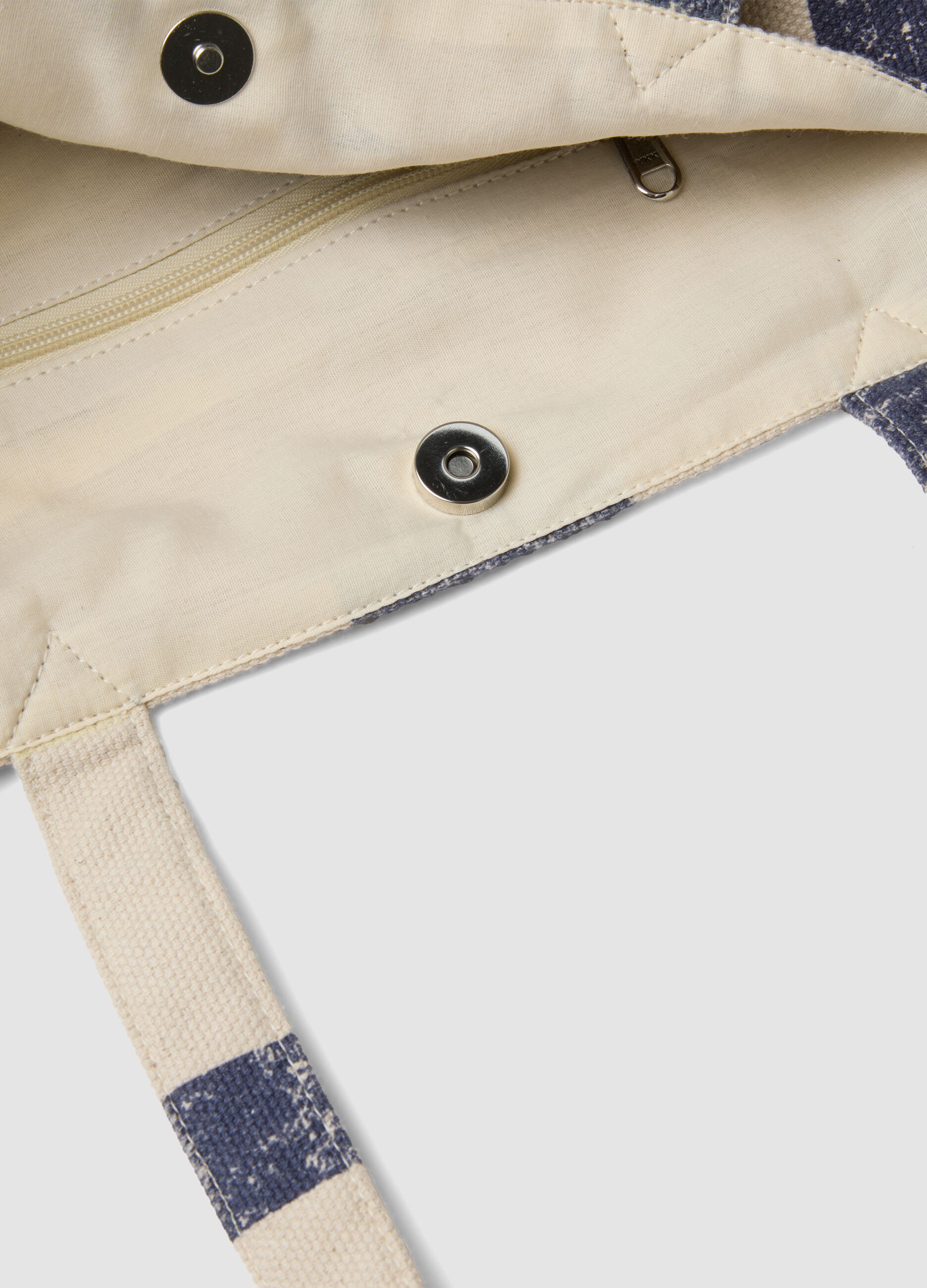 Pure cotton bag with white and blue stripes and button fastening