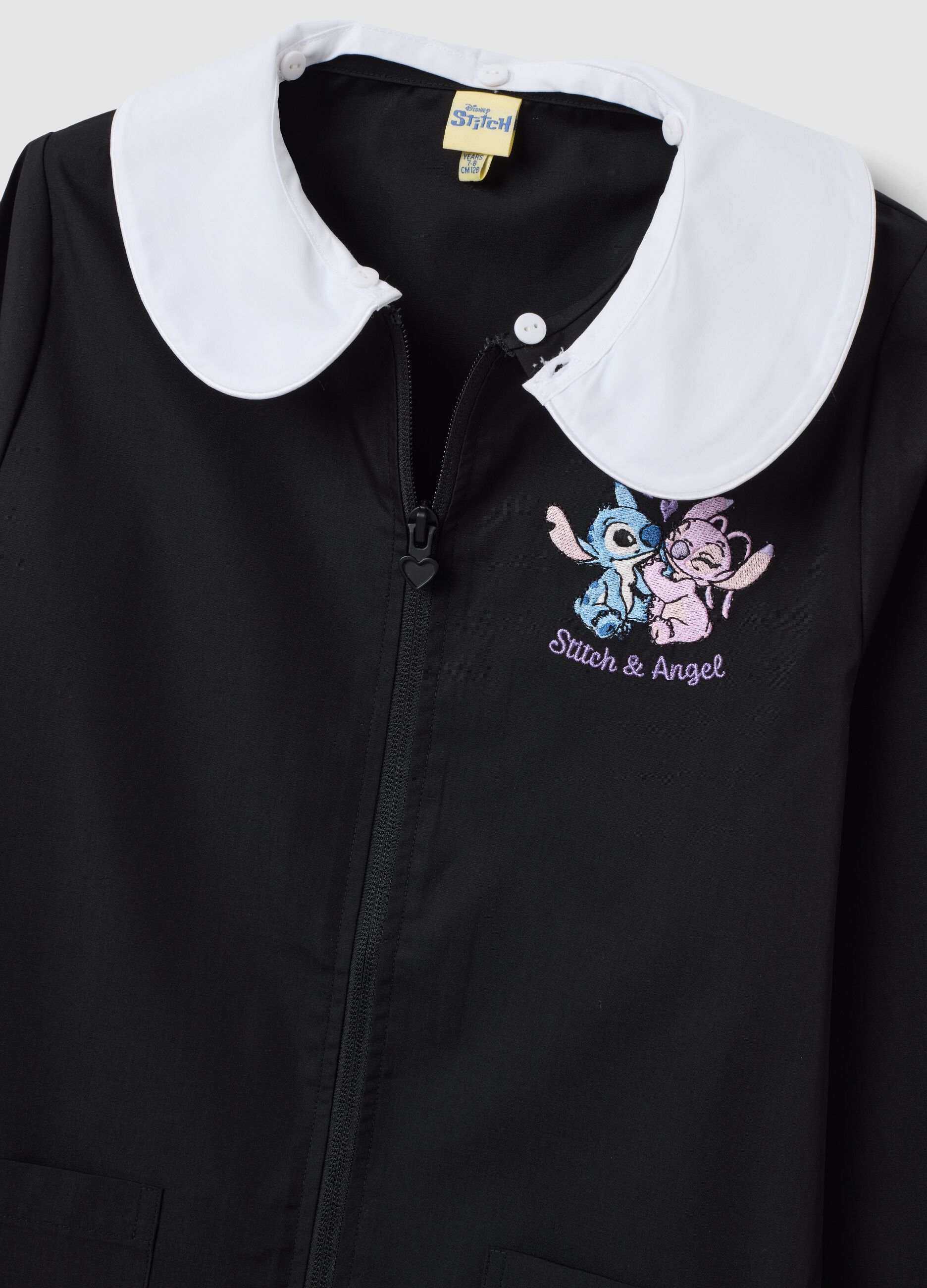 Black girls&rsquo; school apron with zip and white collar, Stitch embroidery
