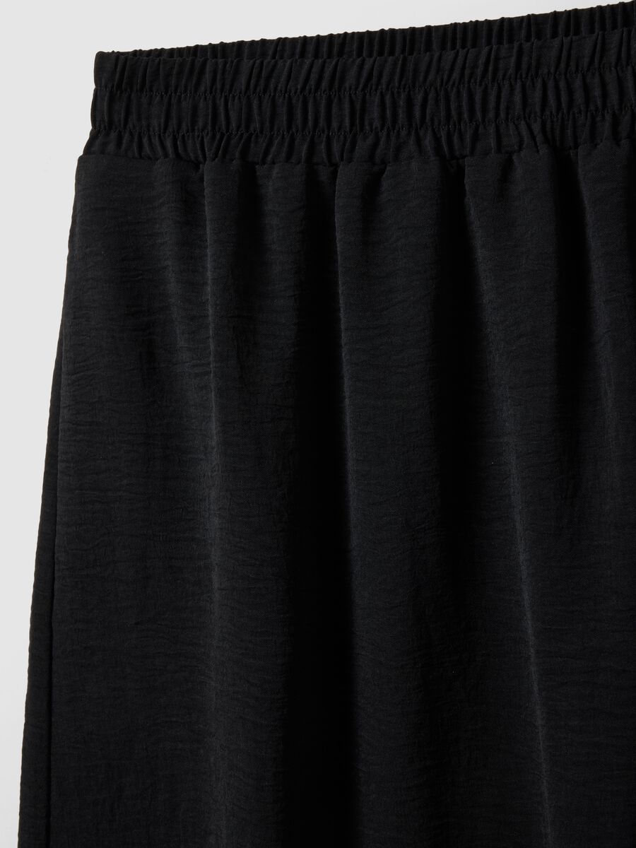 Black long skirt with regular fit, elasticated waist and slit_5