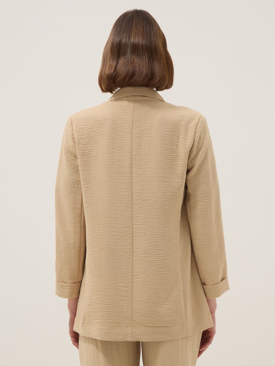 Beige regular-fit buttonless blazer_2
