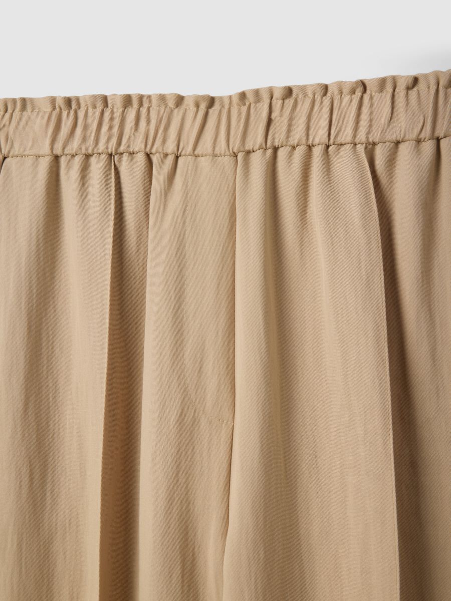 Beige wide leg jogger trousers in Lyocell and viscose blend_5