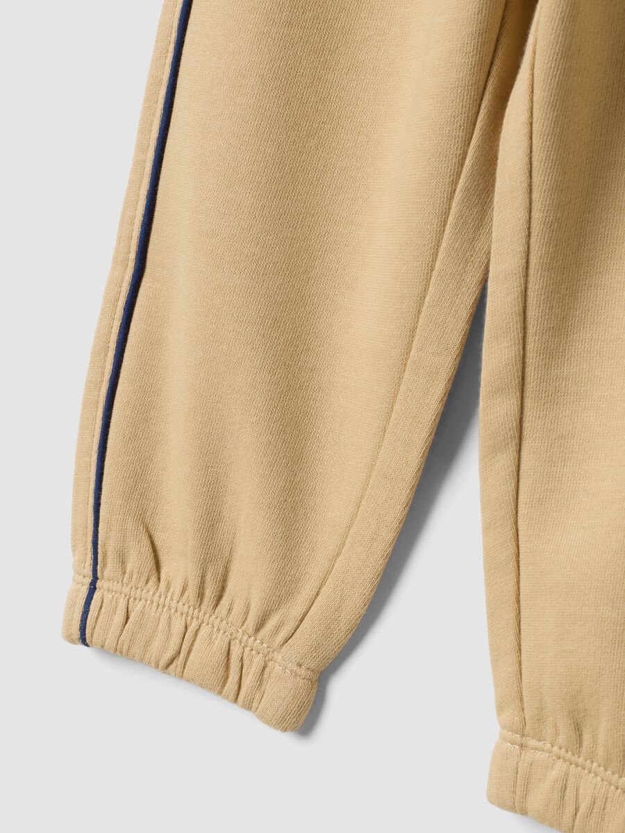 Beige pure cotton joggers with print_3