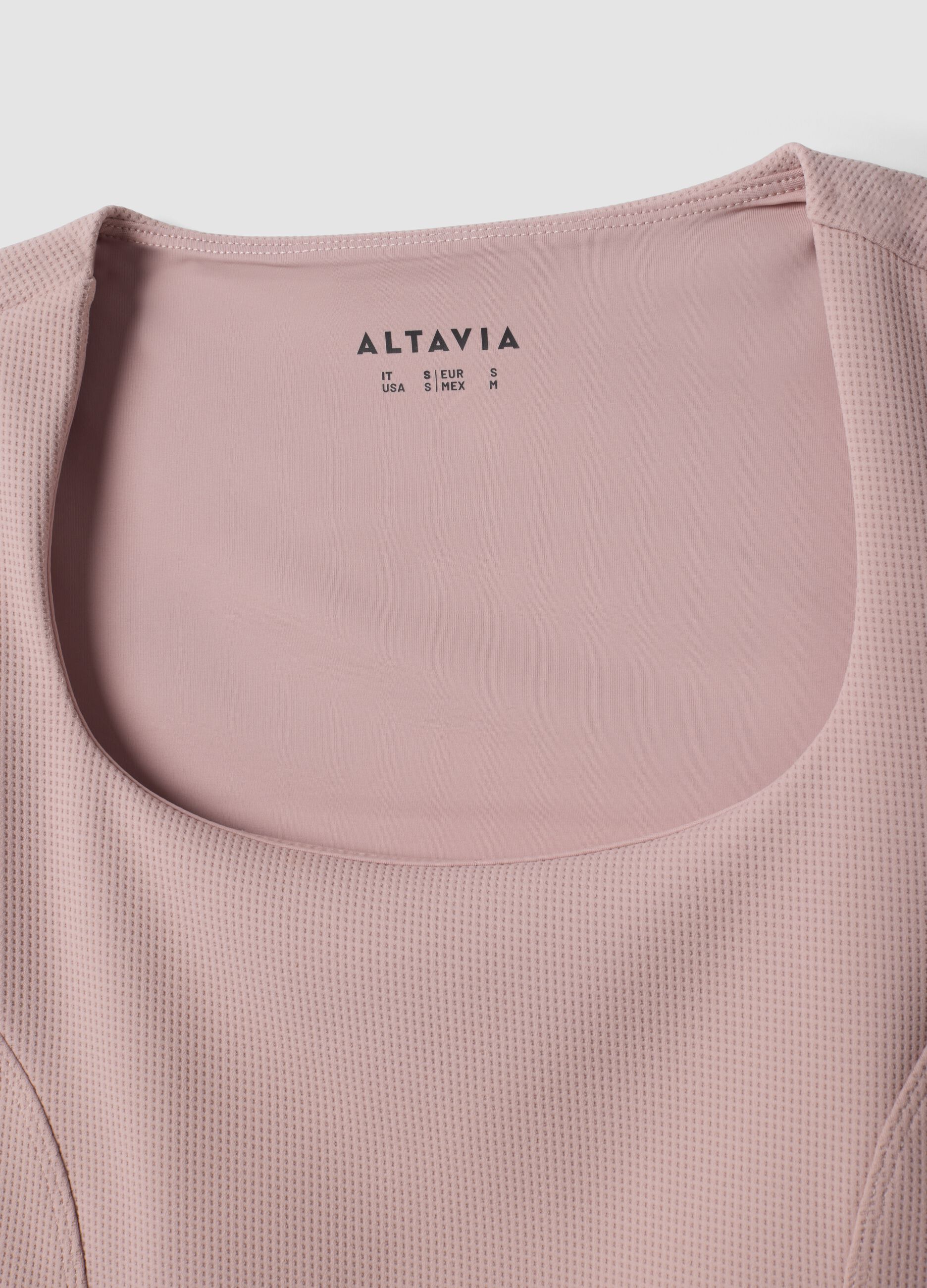 Pink cropped top in stretch fabric