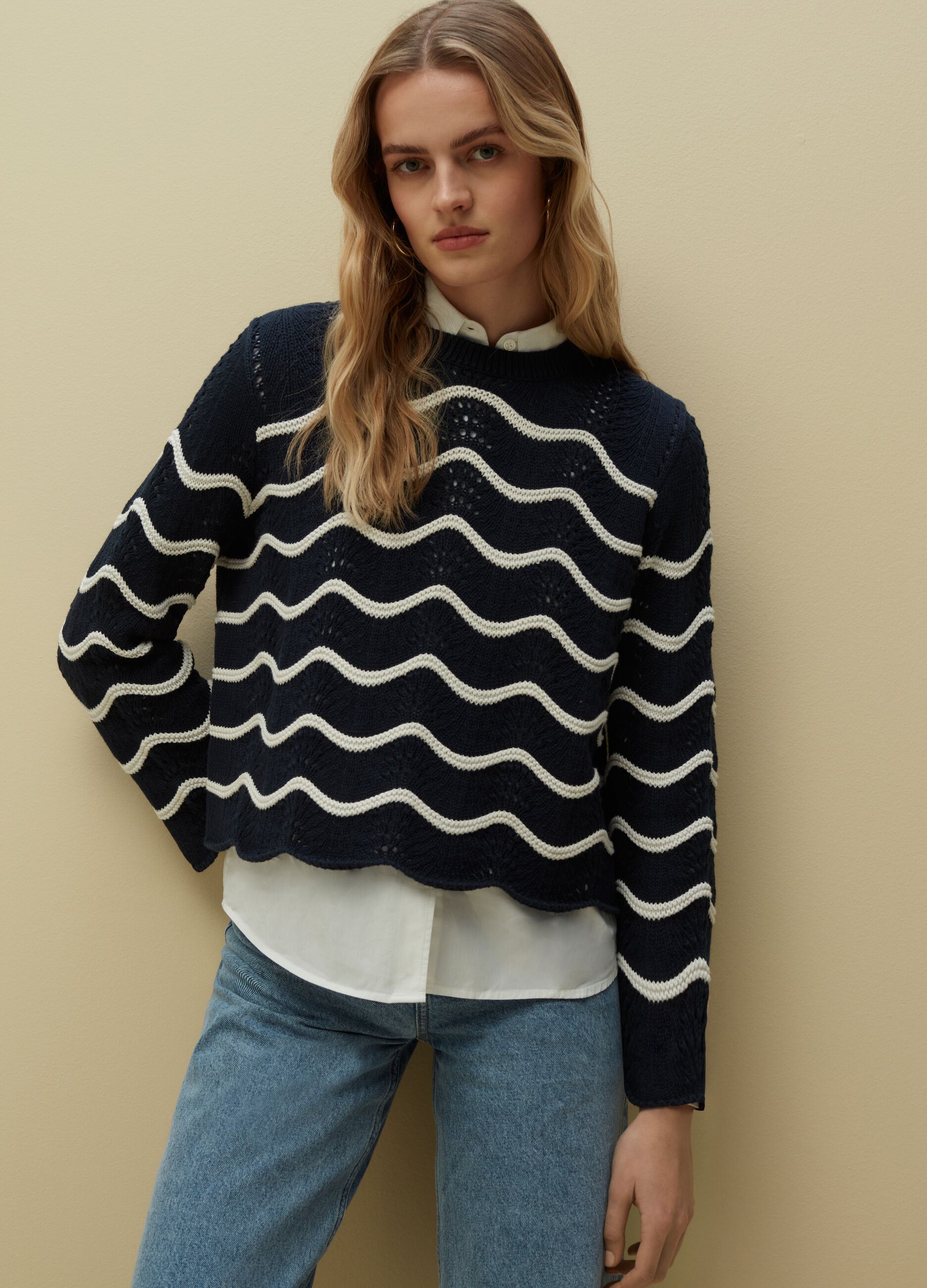Crochet sweater with waved stripes