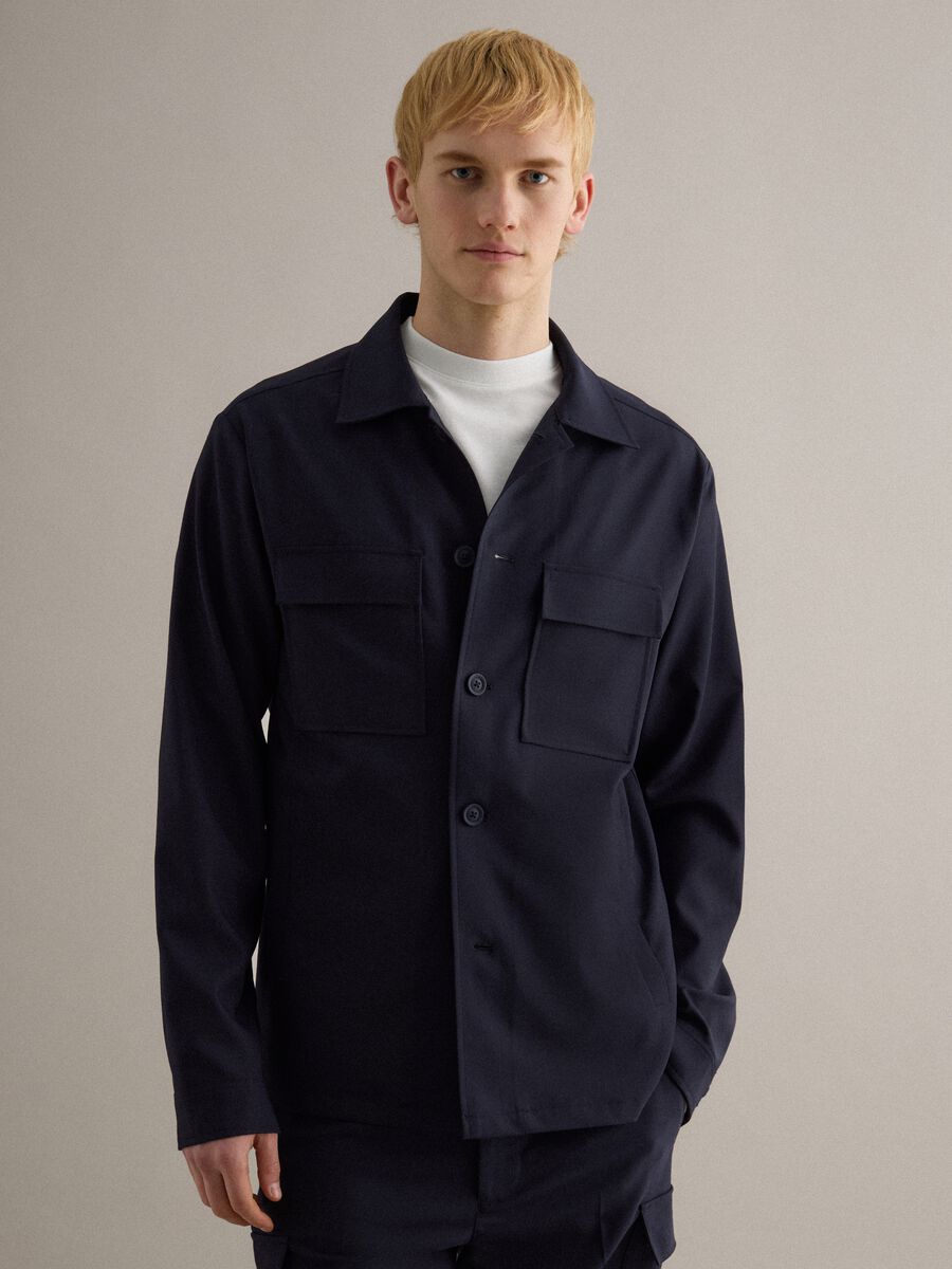 Light blue regular fit jacket with buttons and front pockets_0