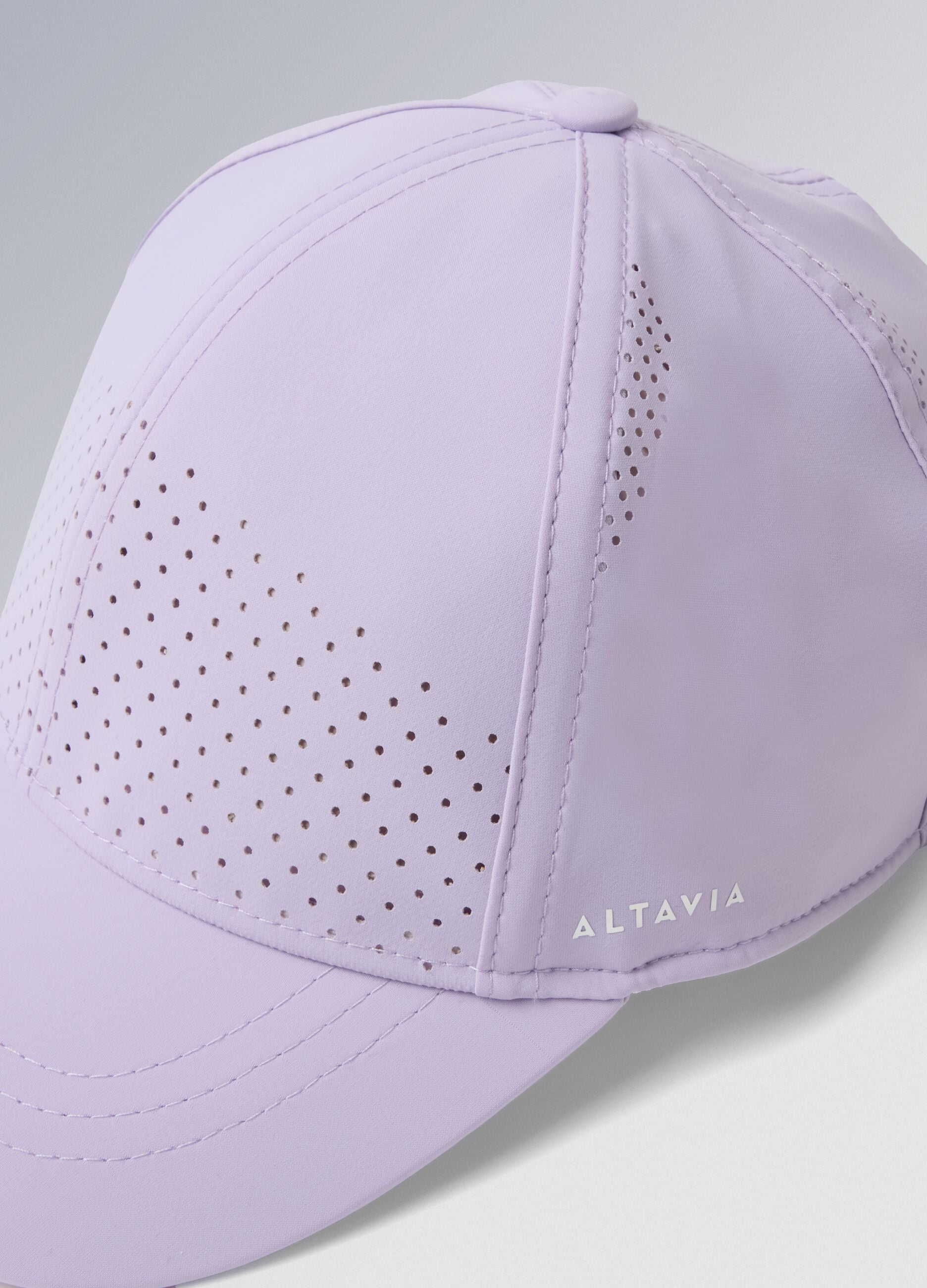 Sportcap ALTAVIA COURT in Violett aus Stretchmaterial mit Schirm