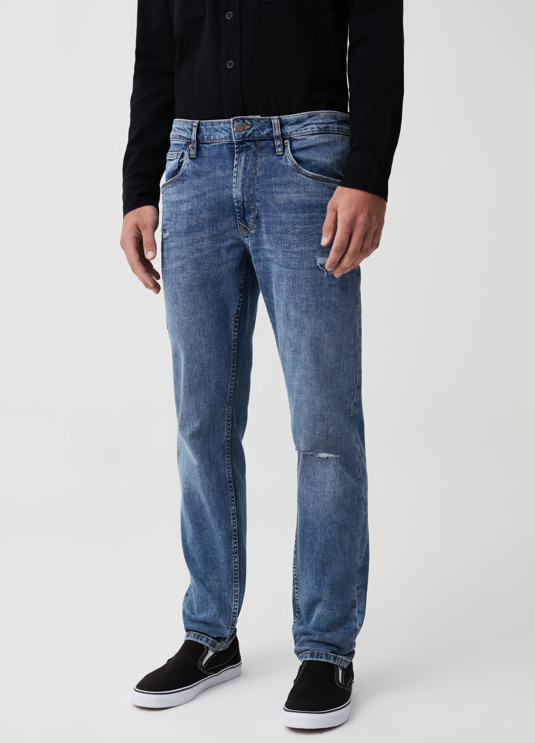 Slim-fit jeans with abrasions and fading