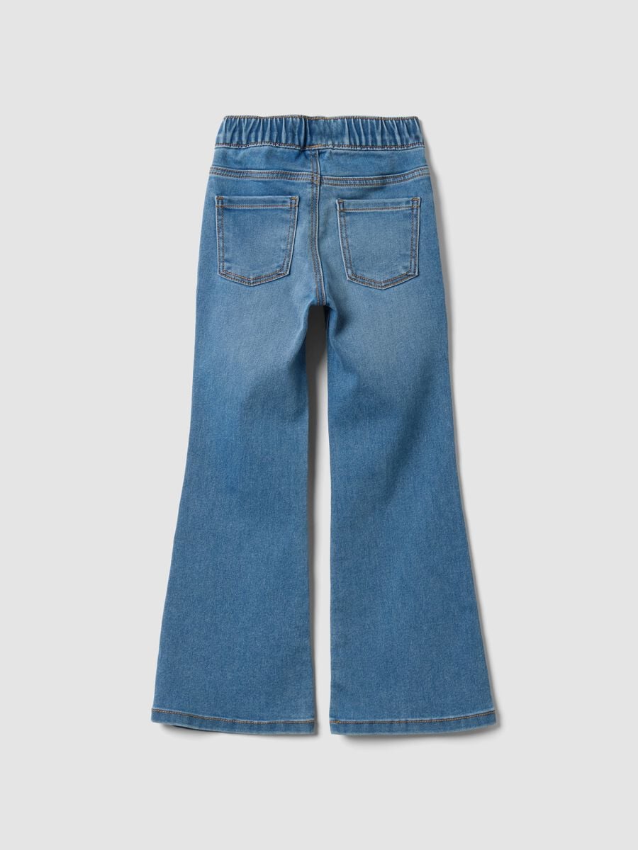Jeggings denim in cotone elasticizzato a zampa con strass per bambina_1