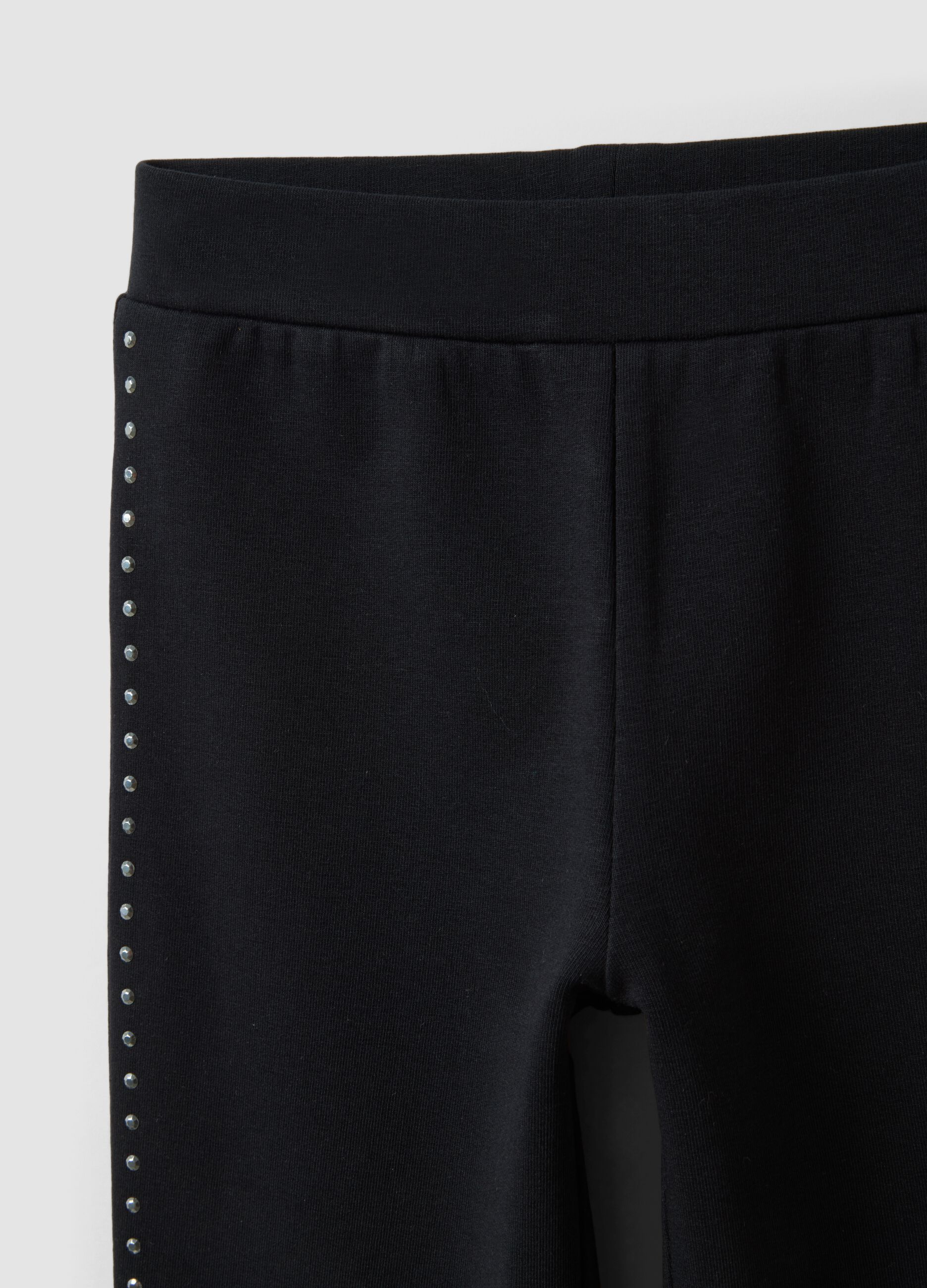 Leggings neri flare in cotone elasticizzato con borchie