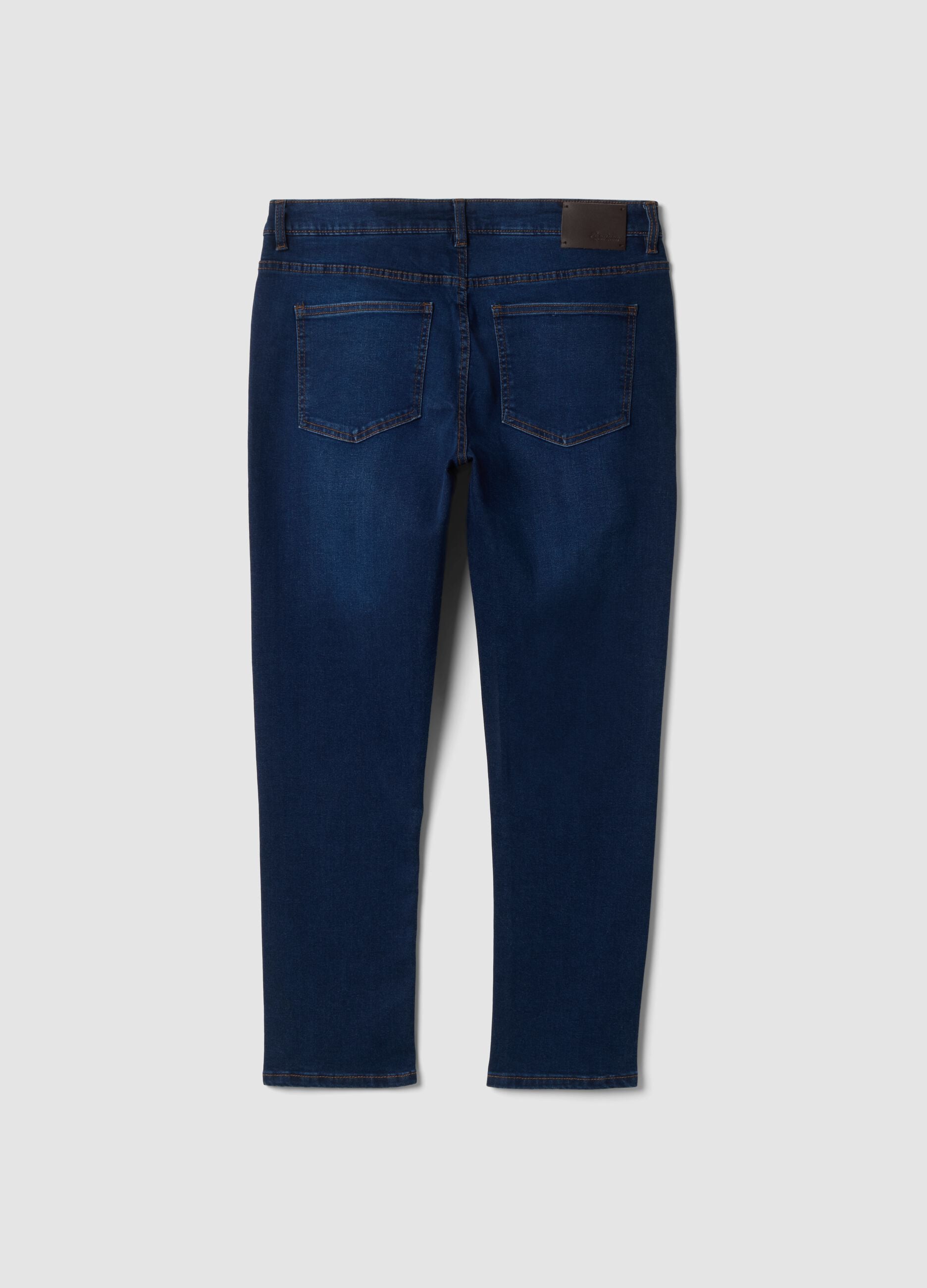 Dark blue stretch cotton slim tapered fit jeans