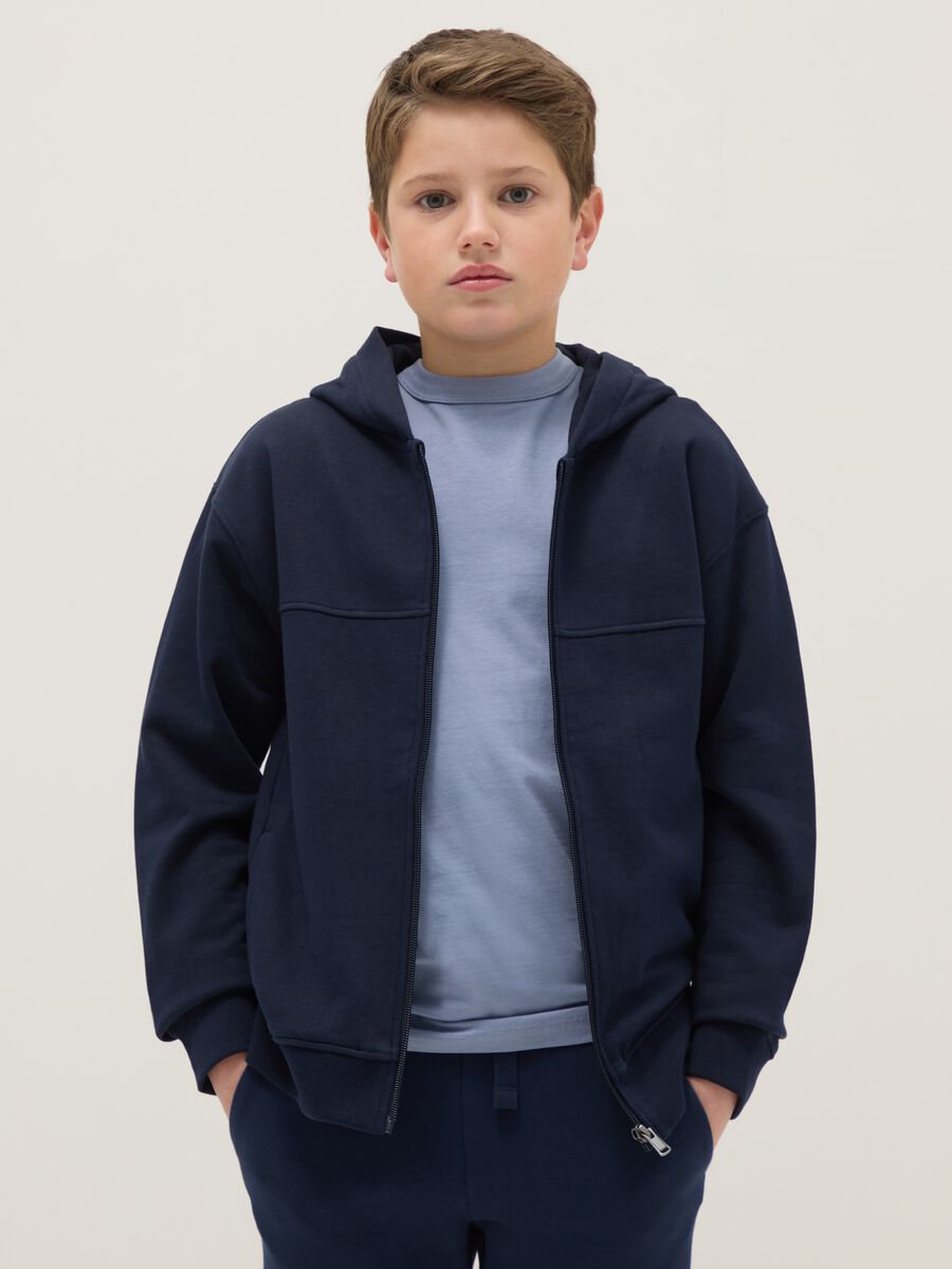Boy's blue hoodie in pure cotton with oversized fit and zip_0