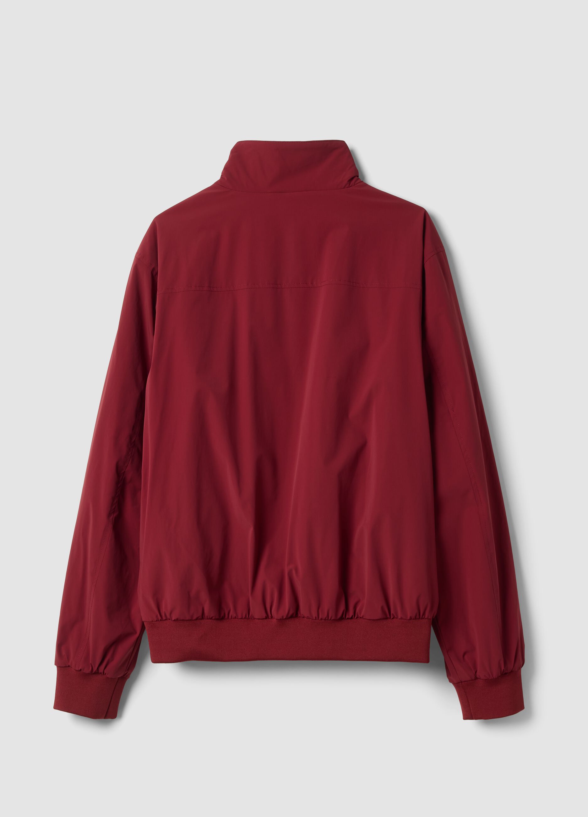 Rote Jacke aus Stretchmaterial mit Rei&szlig;verschluss