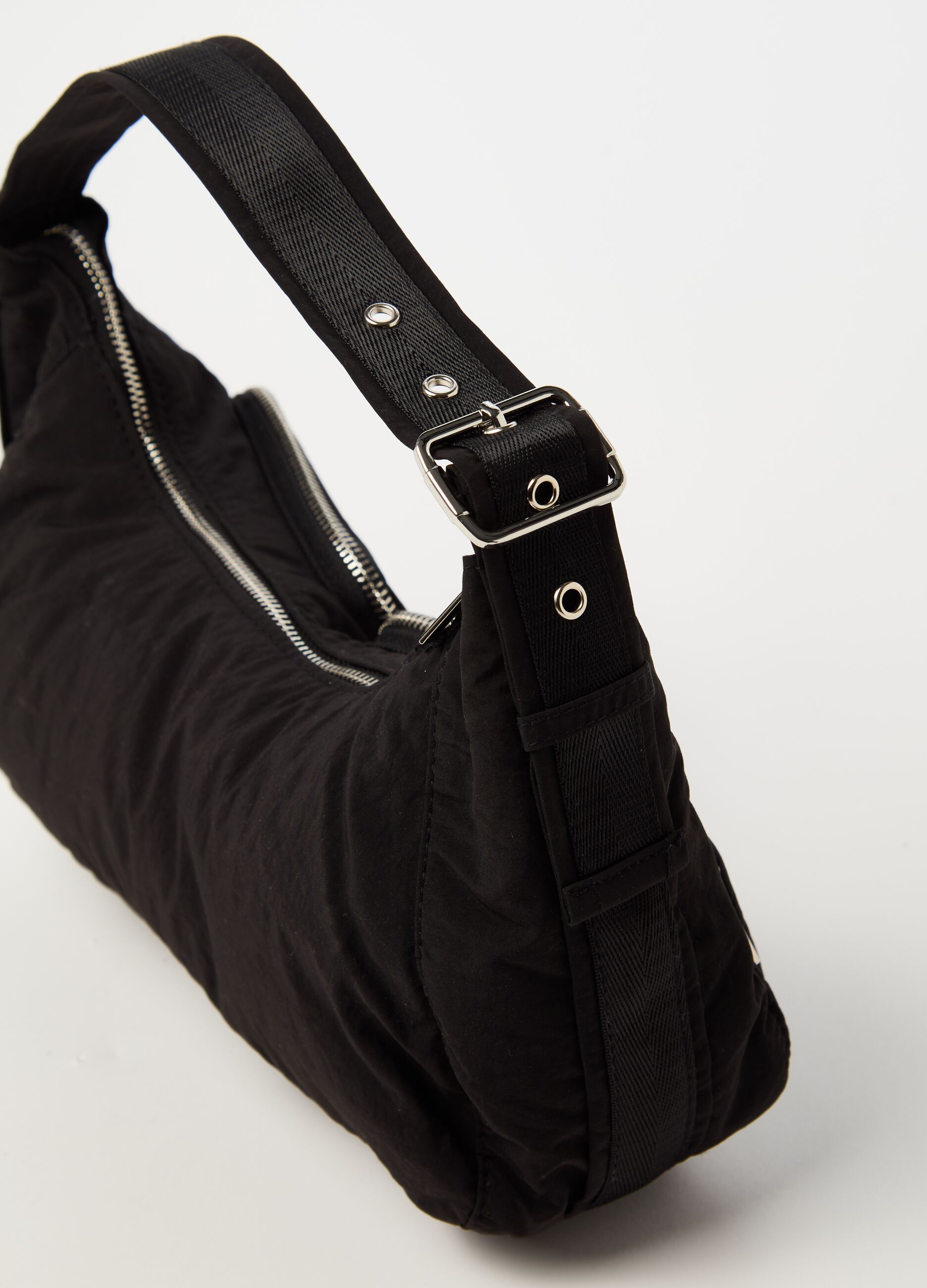 Shoulder bag with external pockets