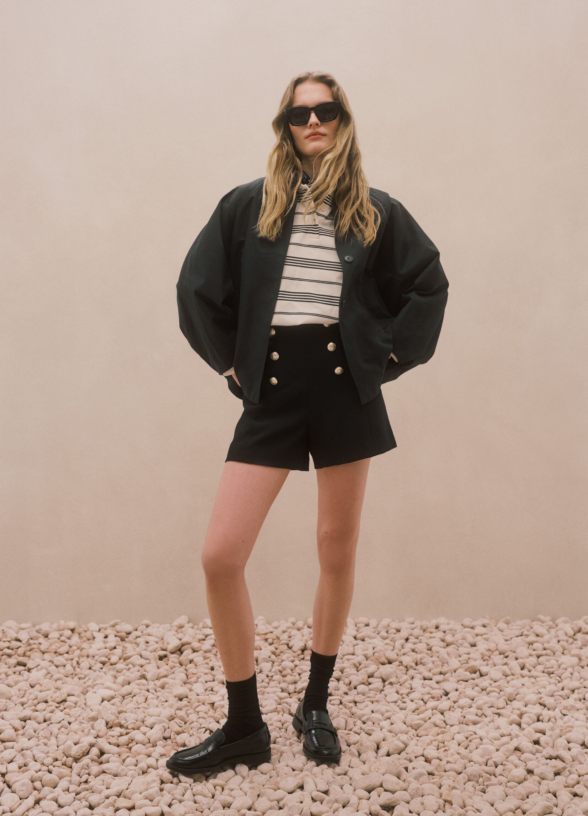 Black regular fit shorts with high waist and gold buttons