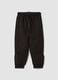 Black cotton-blend joggers with ankle zips_0