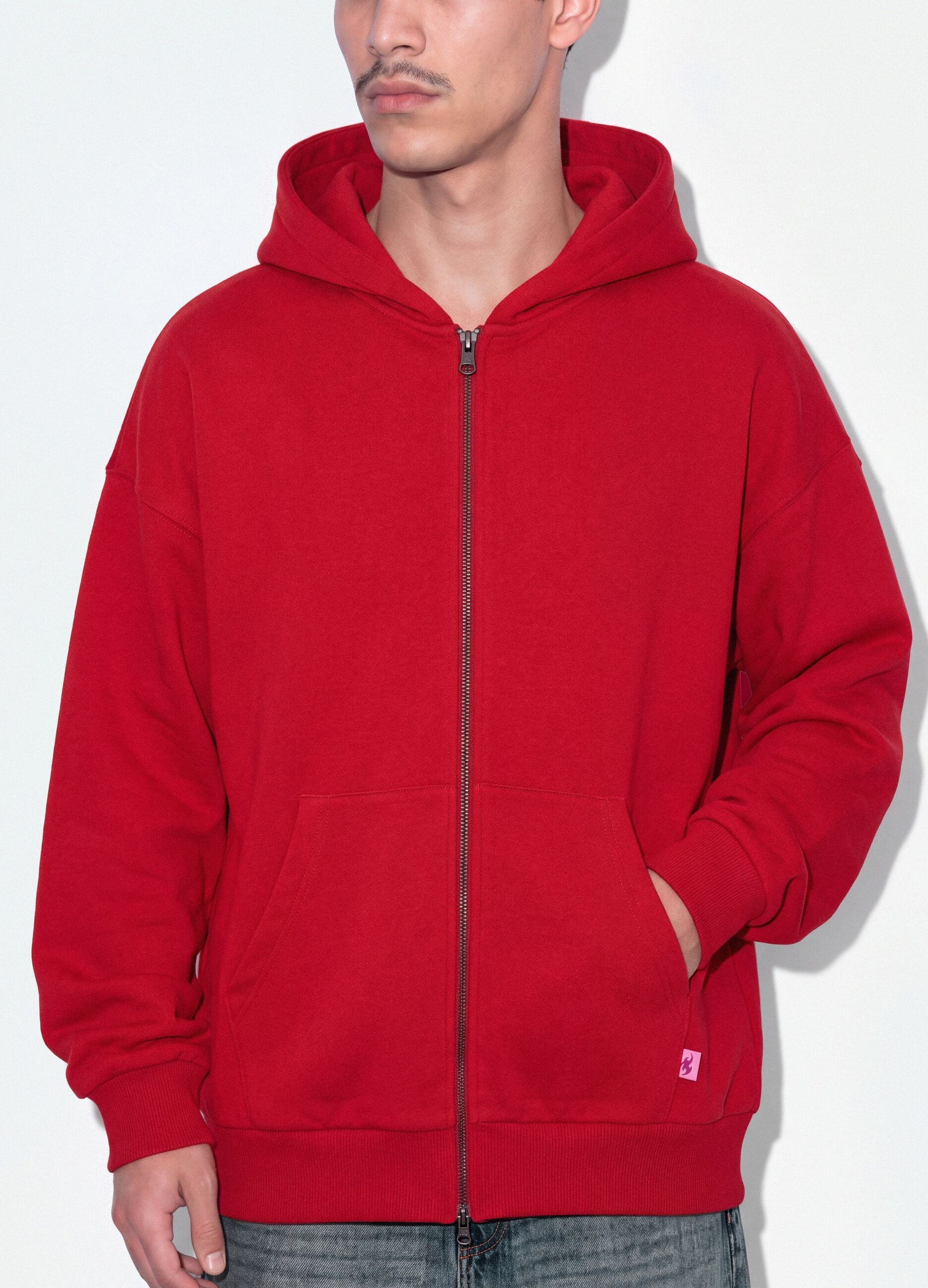 Red 100% cotton sweatshirt with oversized crew neck fit