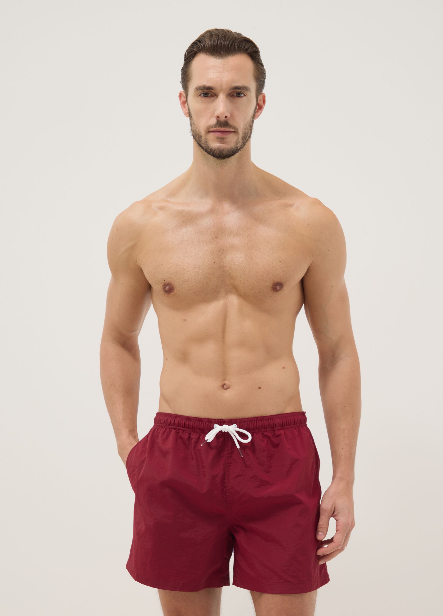 Red regular-fit swim shorts with drawstring