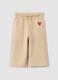 Beige pure cotton trousers with elasticated waist and print for baby girl_0