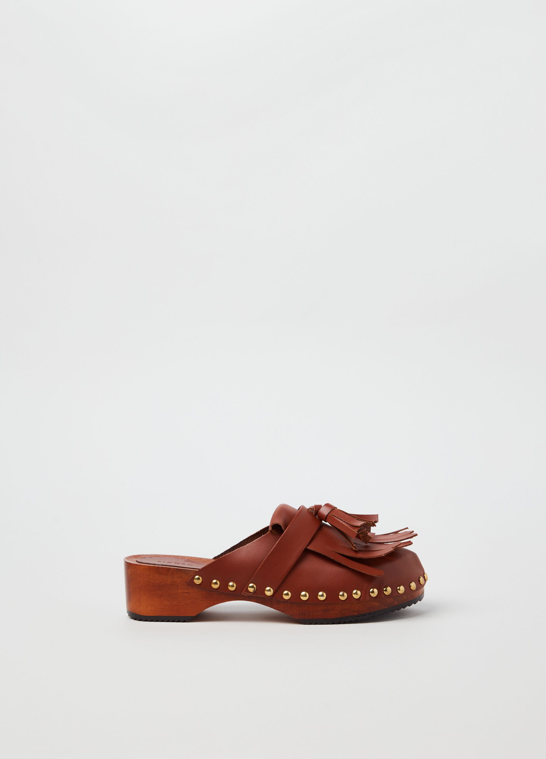 Leather clogs with fringe