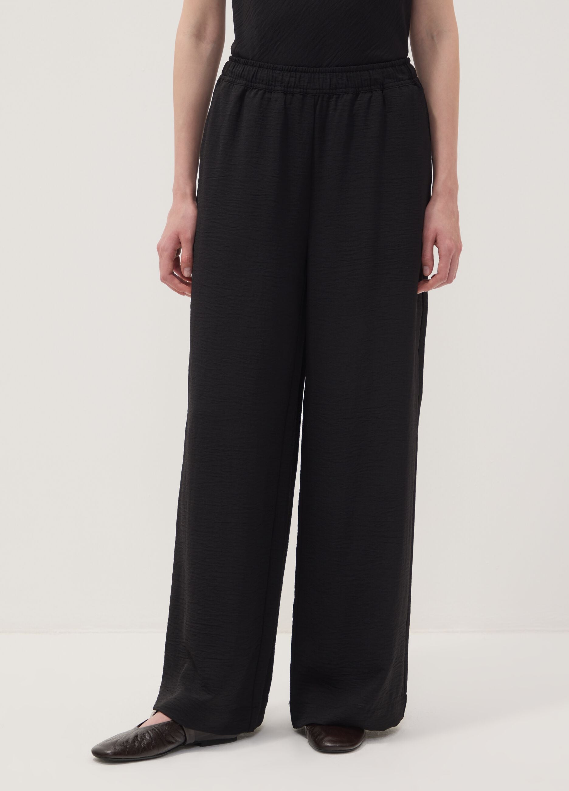 Black wide-leg trousers with elasticated waist