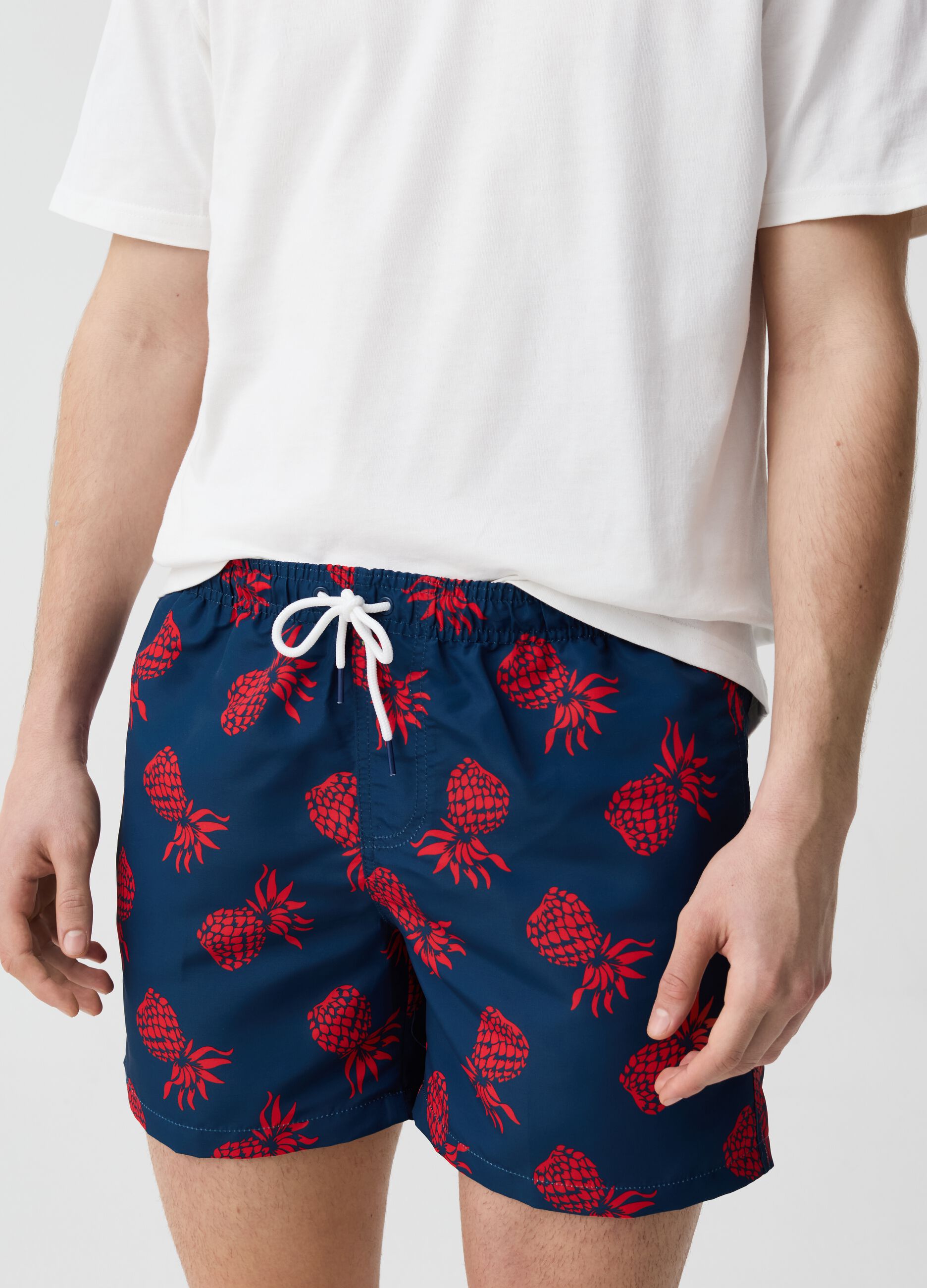 Swimming trunks with pineapples print